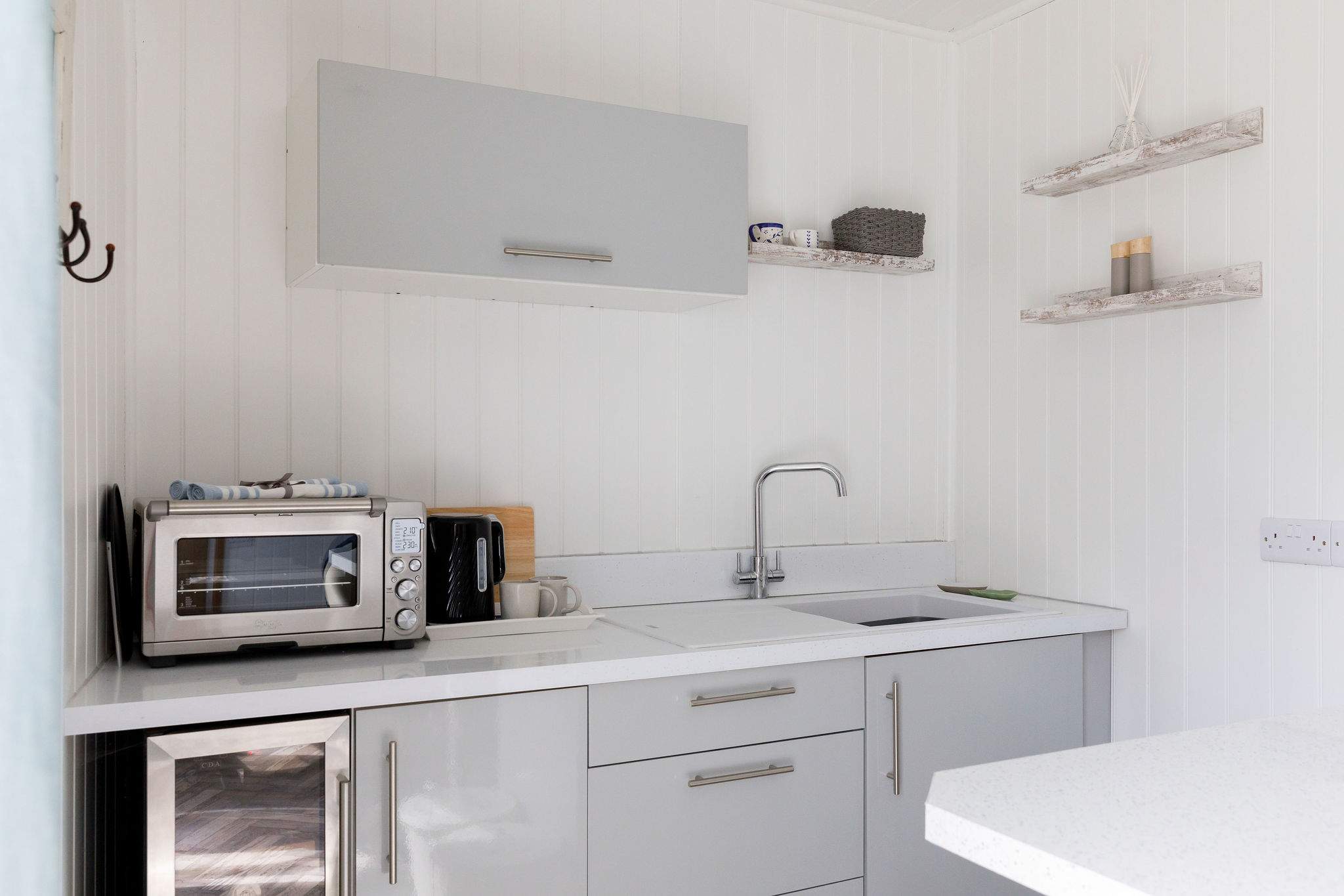 There is a small microwave oven for you to make all your meals and snacks, a mini fridge along with tea making facilities.