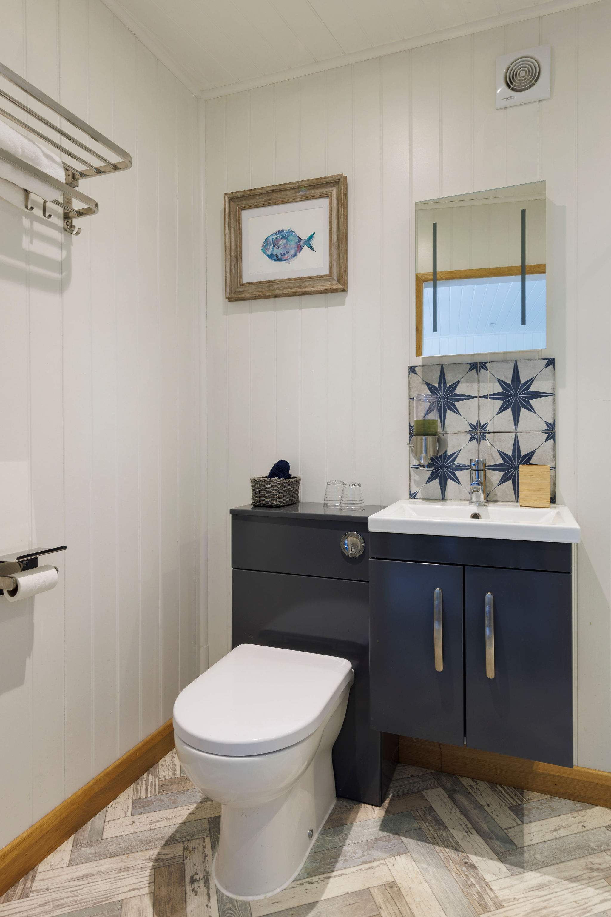 This en-suite is the perfect place to freshen up after a day at the beach or before heading out for dinner.