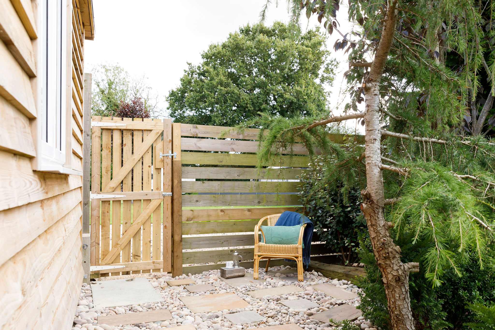 Enjoy the peaceful countryside surroundings from your own private outdoor area with seating. The perfect spot for a morning coffee or evening beverage.