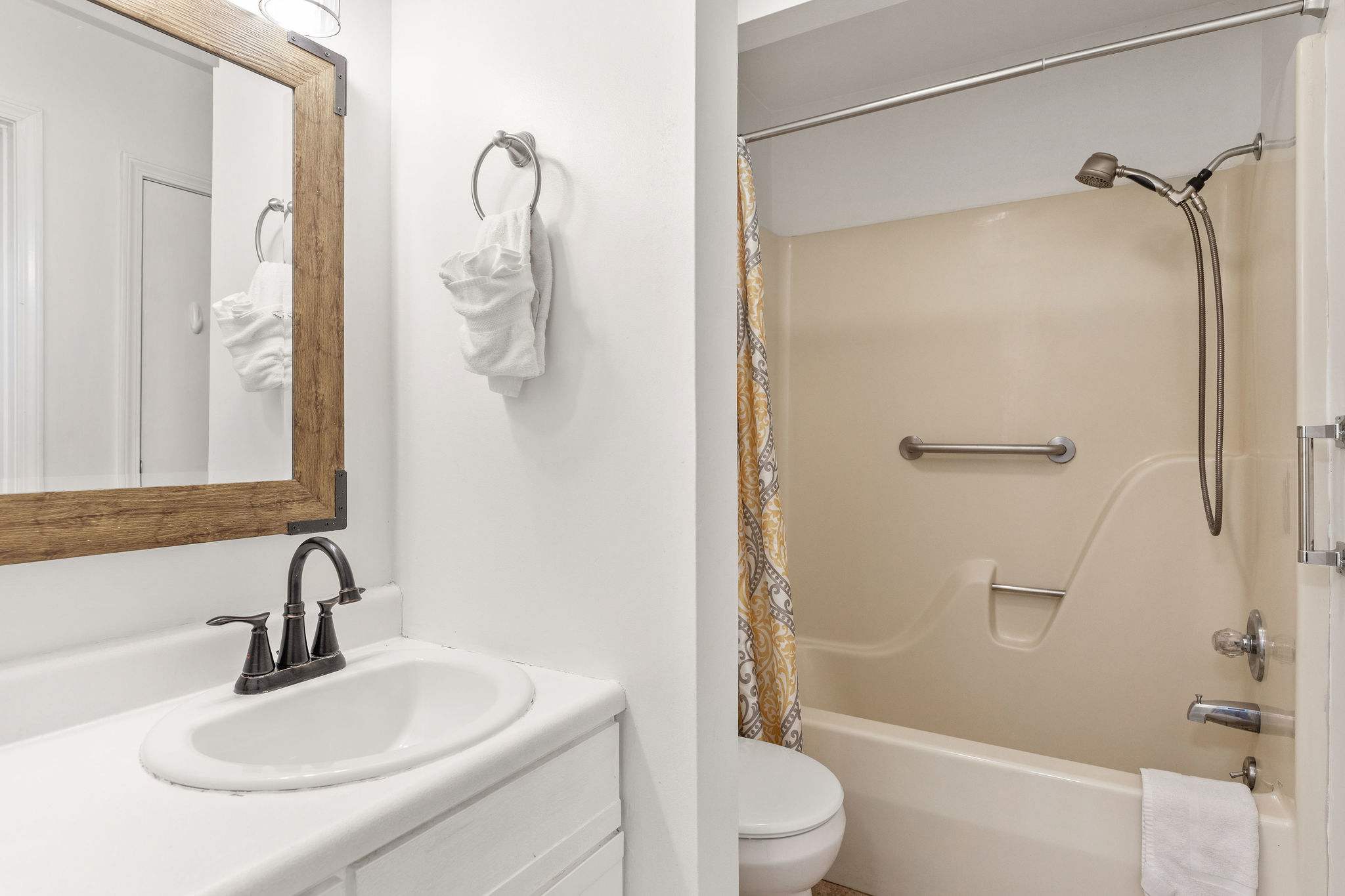 Bathroom with shower tub combo!