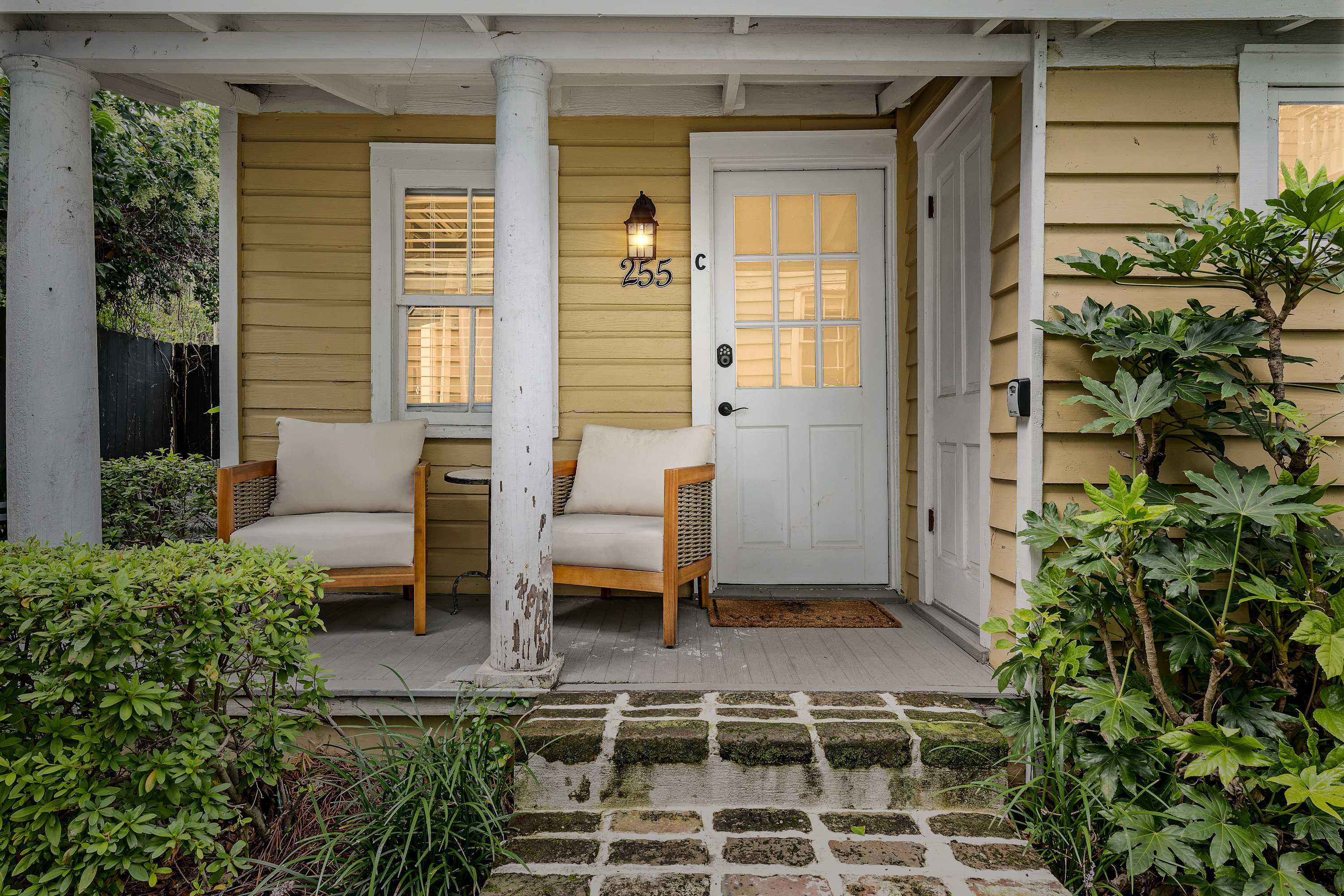 Front porch with outdoor seating 🙂 Looking forward to hosting your group in beautiful downtown Charleston! 