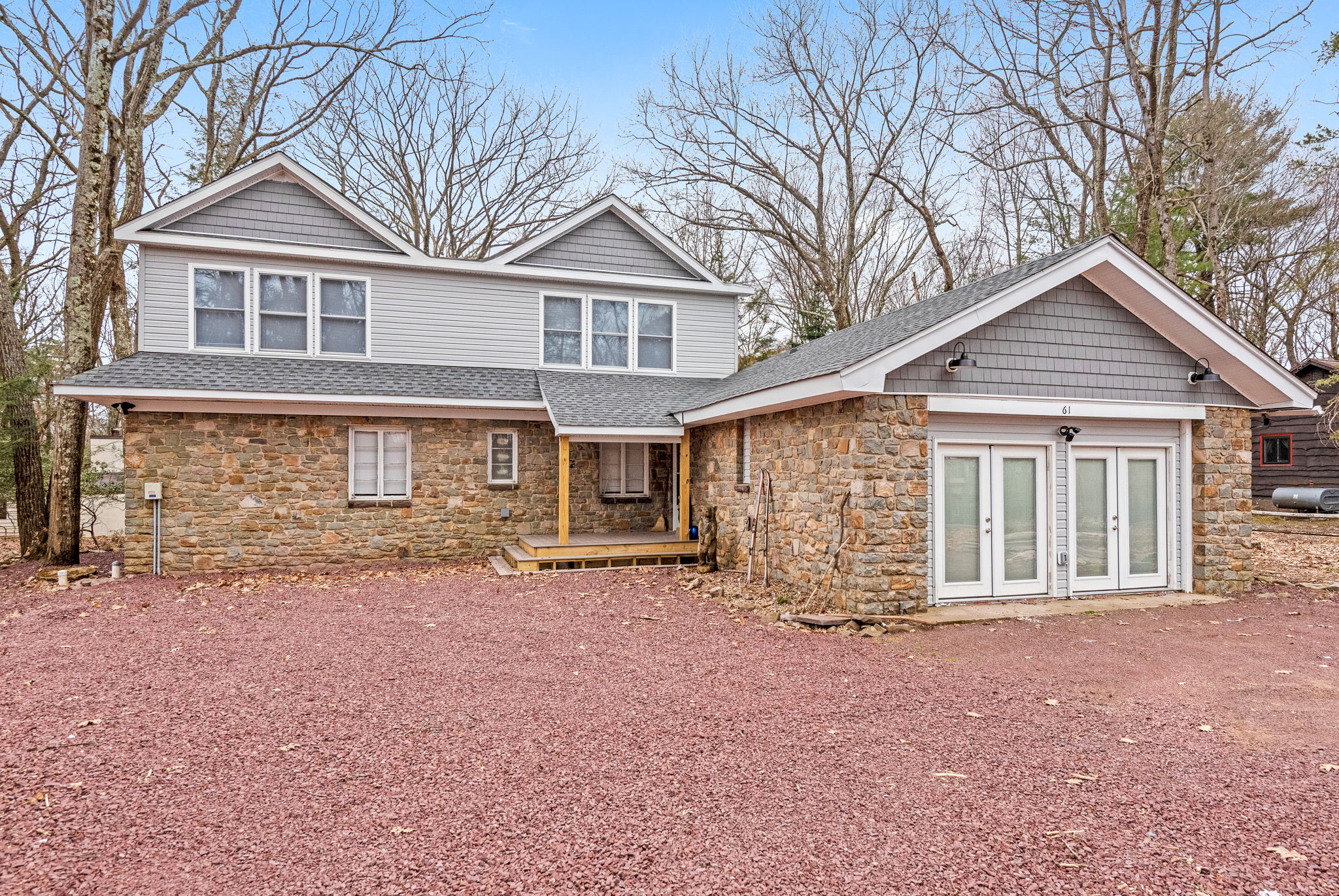 Rustic Elegance Meets Modern Comfort
The home's charming stone exterior and unique architectural design blend rustic appeal with contemporary comfort, offering a warm and welcoming first impression.