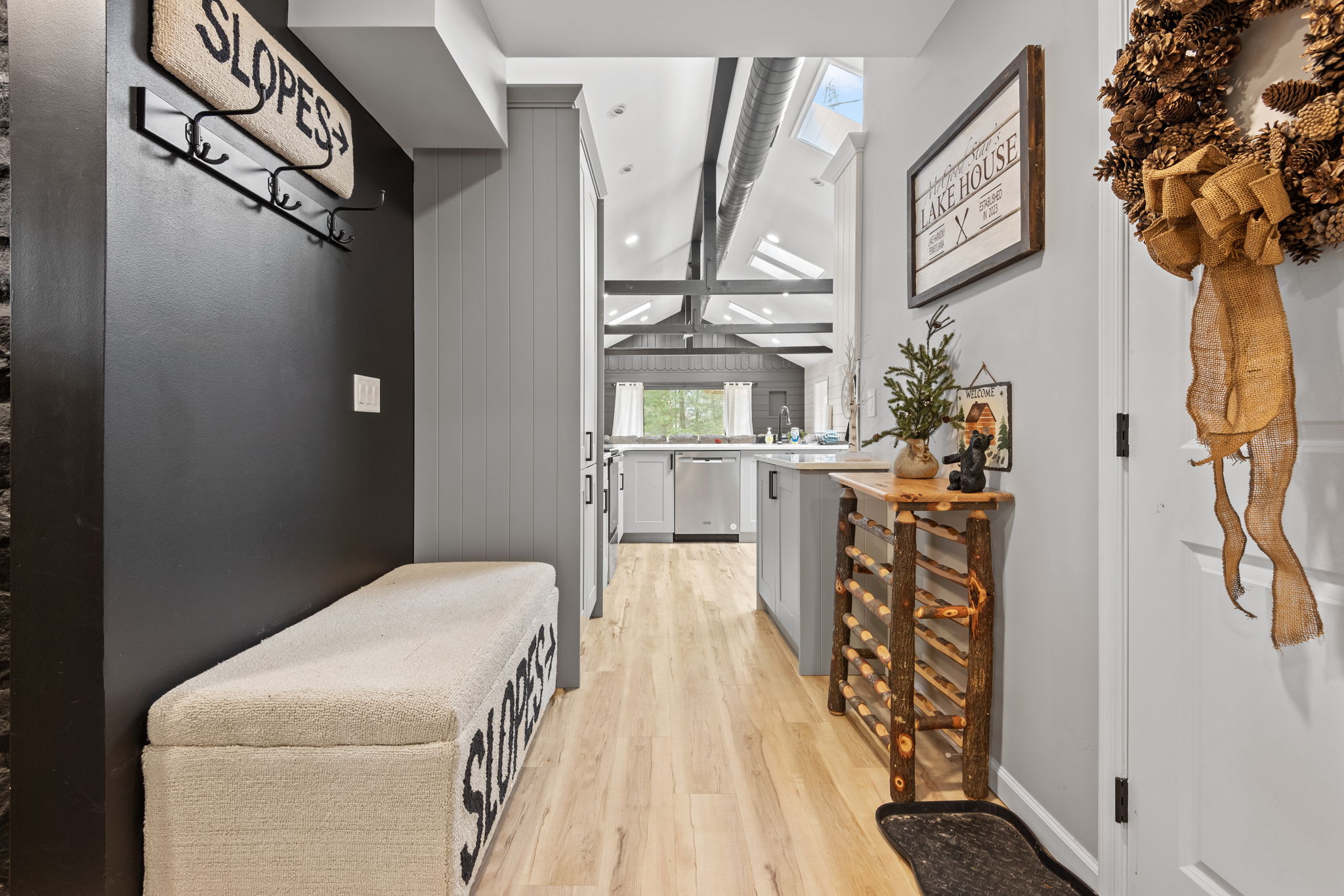 Ski Lodge Vibes with Modern Comfort
Natural wood tones and soft lighting blend seamlessly in this space, creating a warm and relaxing transition between rooms.