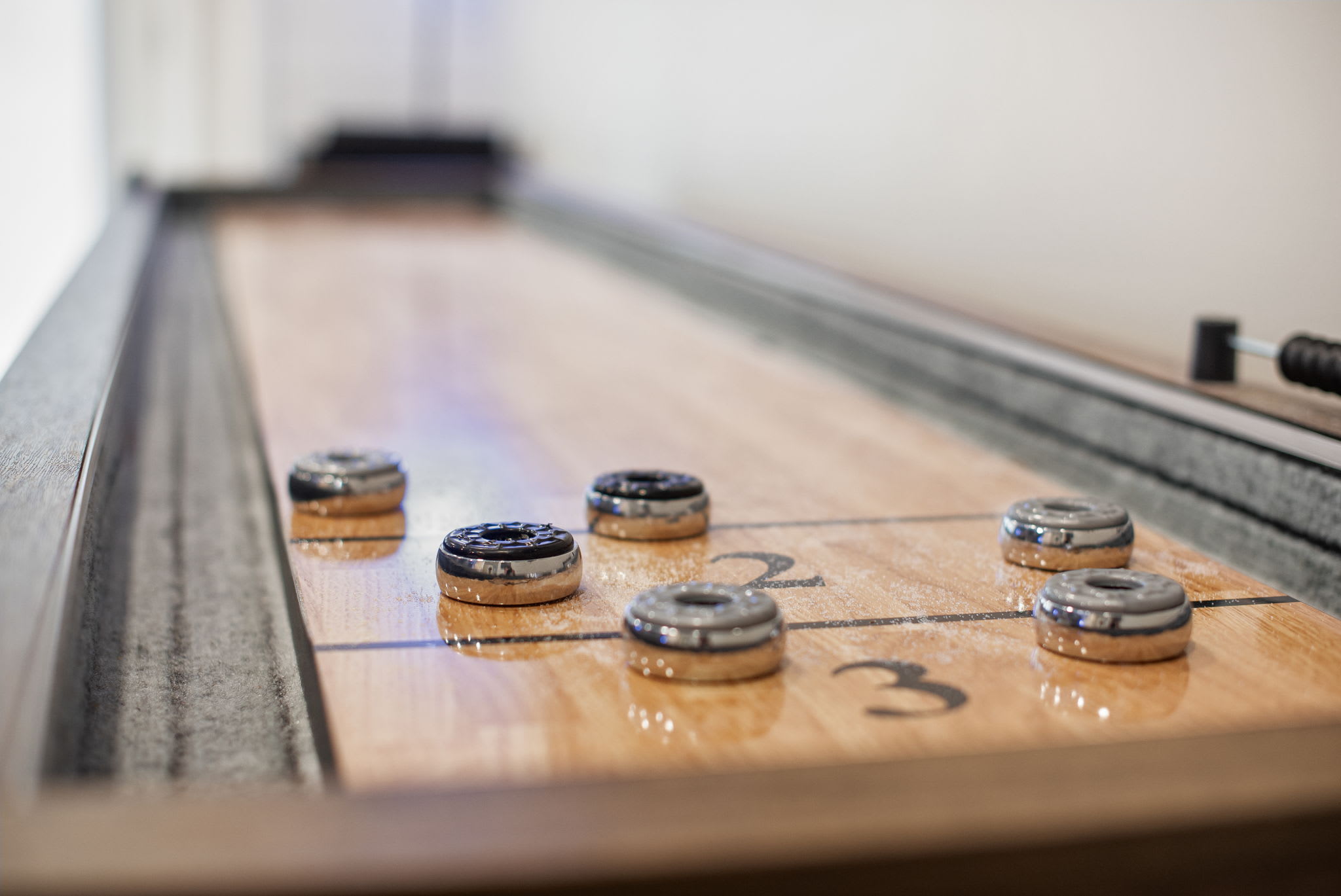 Sleek & Stylish Shuffleboard Table
Bring out your competitive side with this elegant shuffleboard setup. A great way to add some fun to your stay!