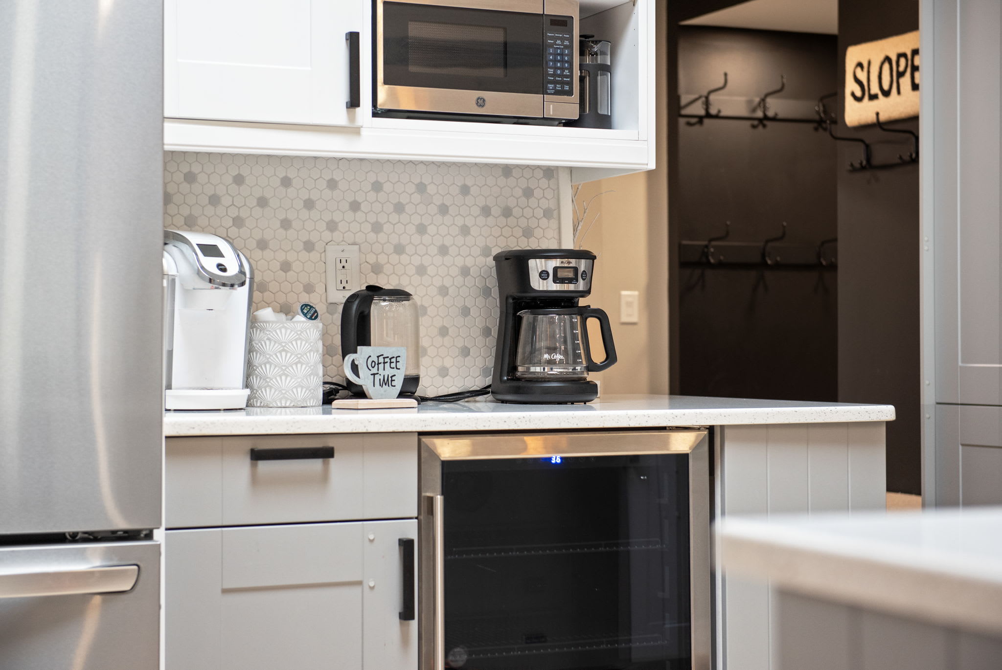 Coffee Bar Perfection
Start your mornings right with a fully stocked coffee station. Whether you prefer drip coffee, espresso, or tea, this cozy setup has everything you need for the perfect cup.