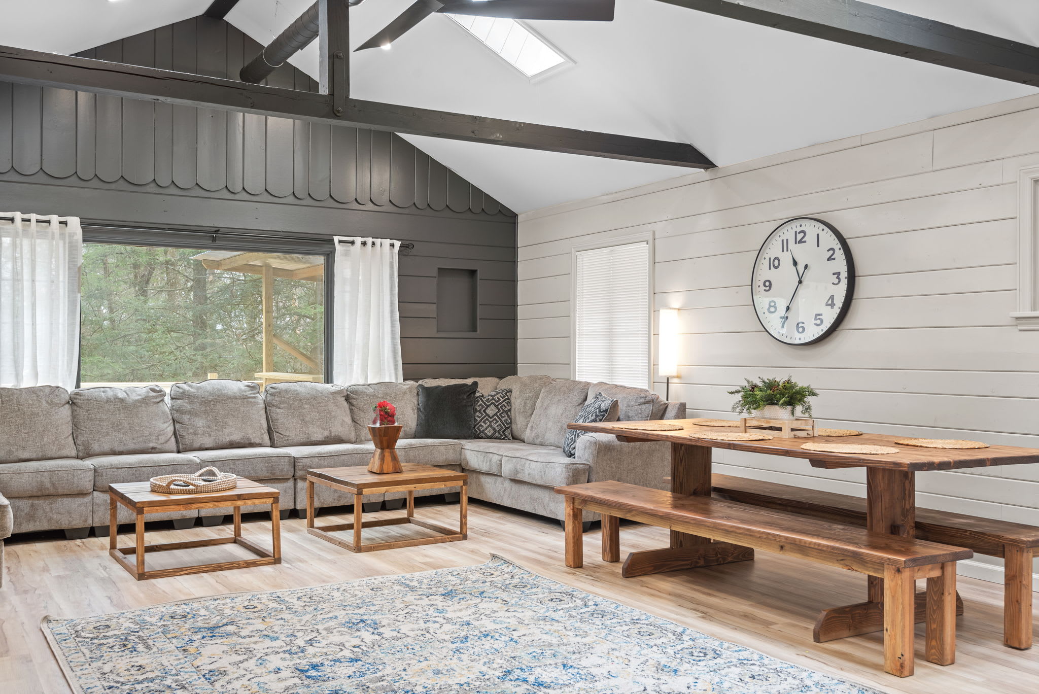 Spacious Lounge & Dining Area
A perfect setting for meals and memories! This inviting space offers a large farmhouse-style dining table and plush seating for everyone to relax and enjoy.