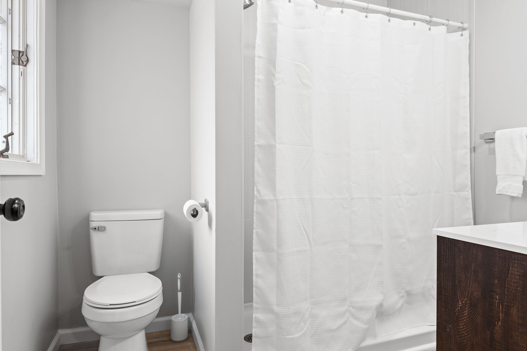 Bright & Modern Bathroom
A clean and stylish bathroom featuring a sleek vanity, fresh white shower curtain, and soft lighting, creating a refreshing space to start or end your day.