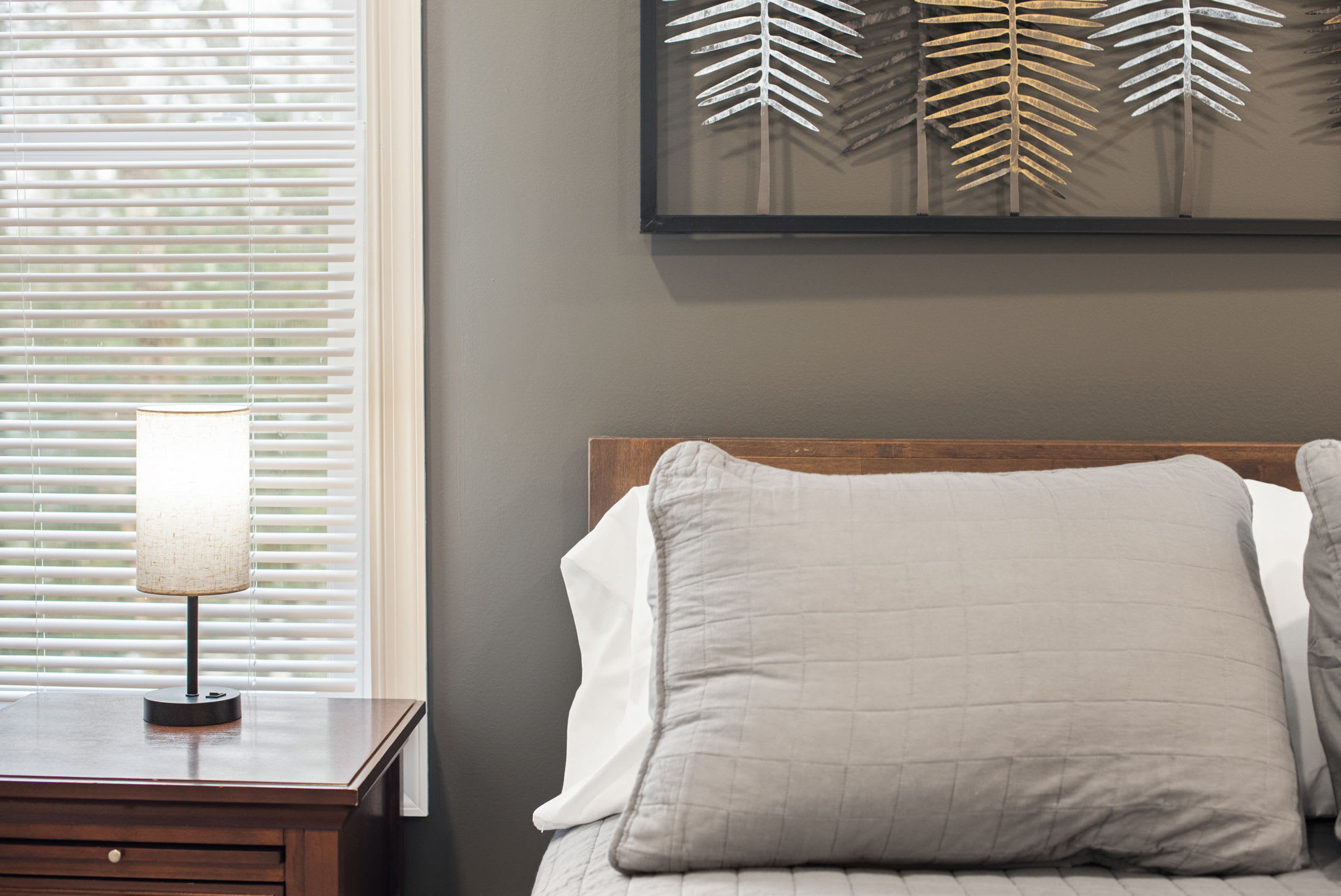 Thoughtful details, from plush linens to warm lighting and nature-inspired decor, create the perfect space for a restful night’s sleep.