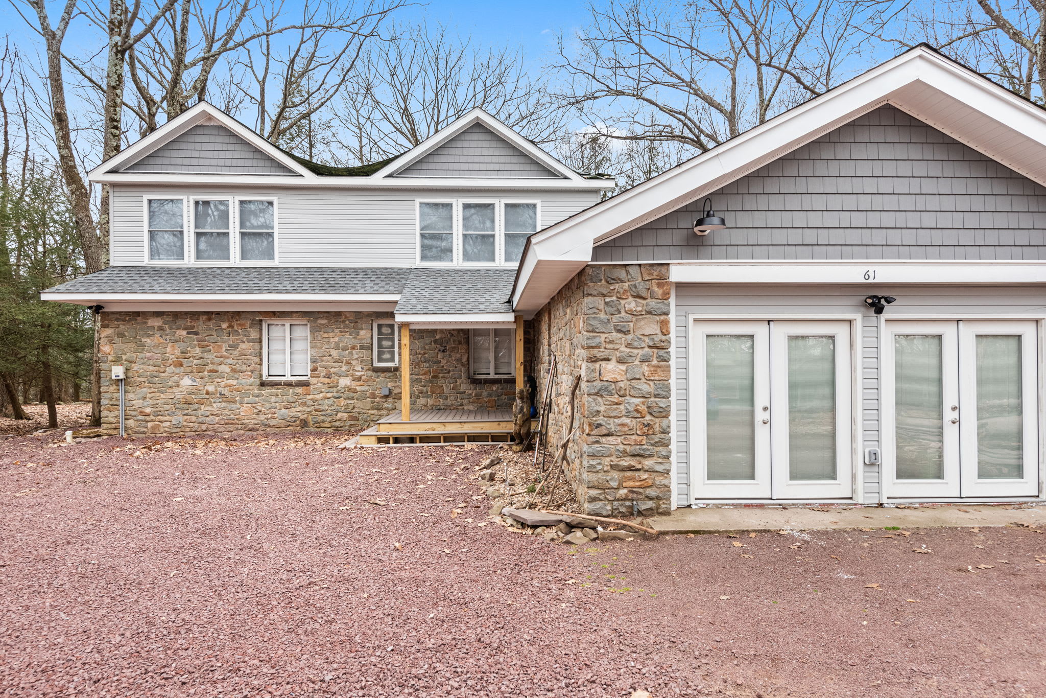 The home's impressive two-story design and large driveway ensure plenty of space for guests, making it the perfect destination for group getaways or family retreats.
