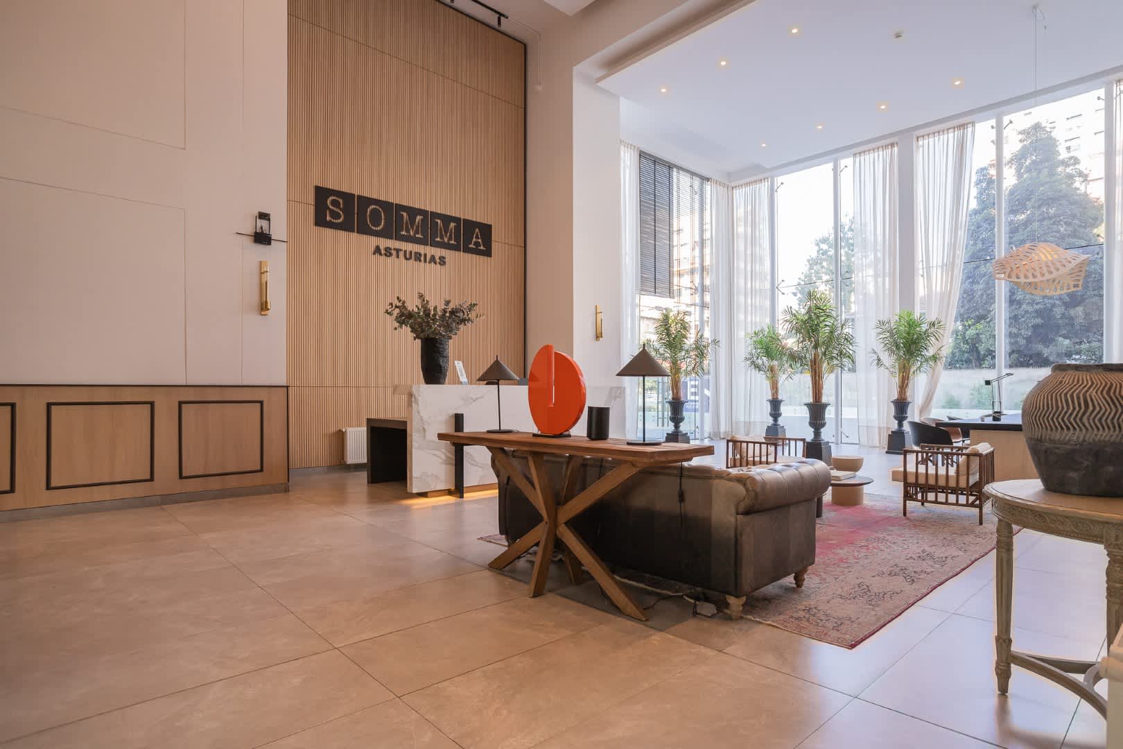 Experience luxury in our elegant lobby, featuring modern decor and abundant natural light, perfect for relaxing or meeting friends.