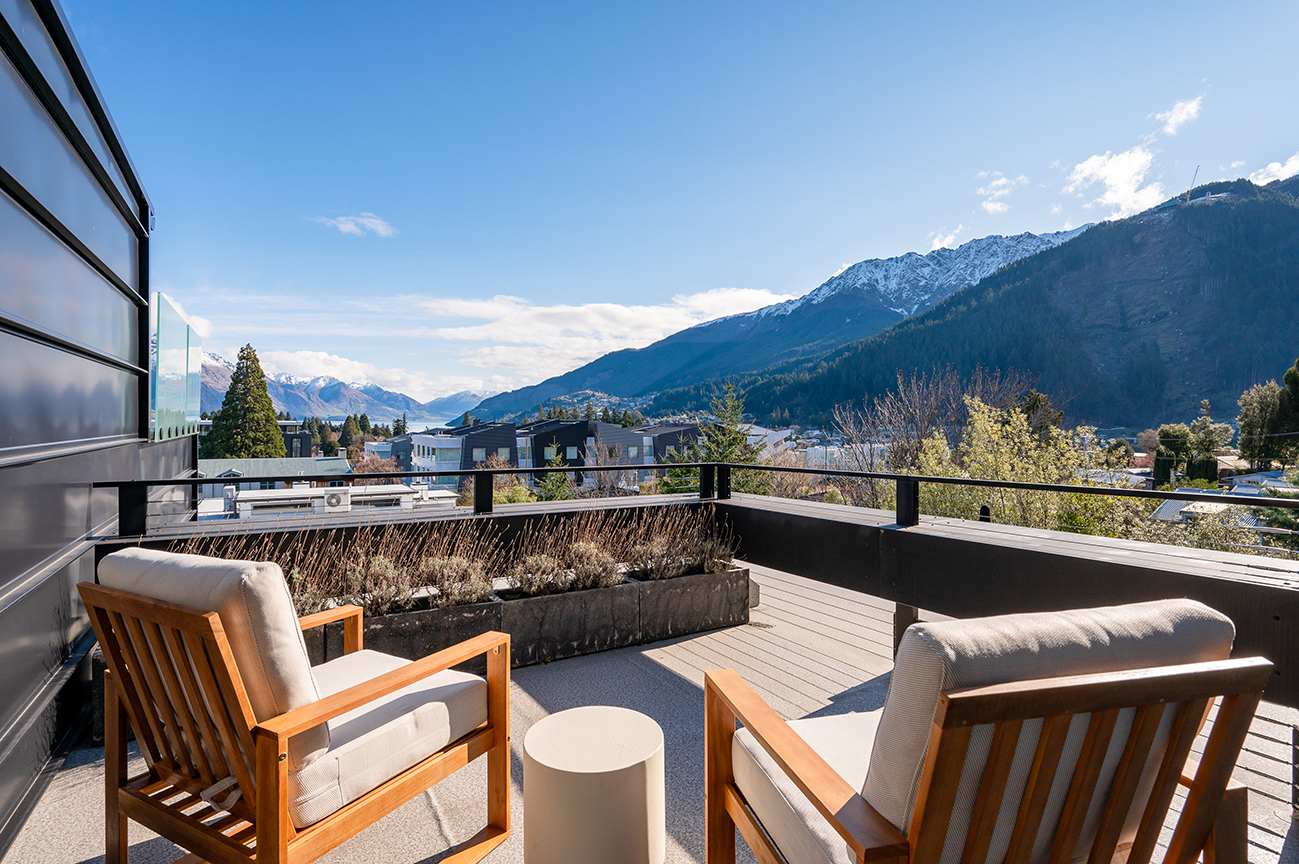 Private Master Bedroom Patio with Lake Wakatipu Views
Step out from the master bedroom onto your private patio, offering breathtaking views of Lake Wakatipu and Queenstown’s surrounding mountains. The perfect spot for morning coffee.