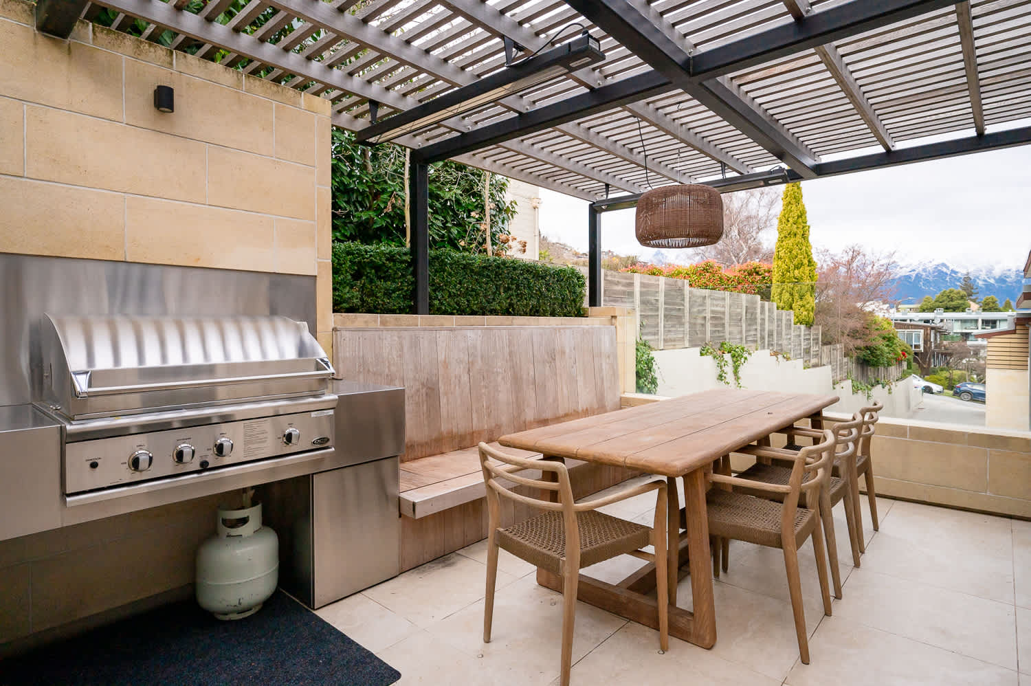 Private Outdoor BBQ Area for Entertaining
This spacious BBQ area offers a perfect setup for outdoor dining and entertaining, with a modern grill and comfortable seating. Enjoy relaxed evenings in a private, sheltered setting.