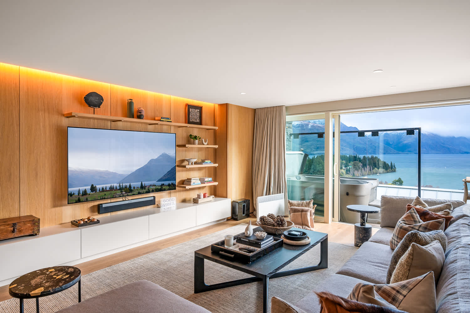 Cozy Living Space with Panoramic Lake Wakatipu Views
This cozy second living room provides a peaceful retreat with panoramic views of Lake Wakatipu. Whether you’re lounging with a book or enjoying time with family.