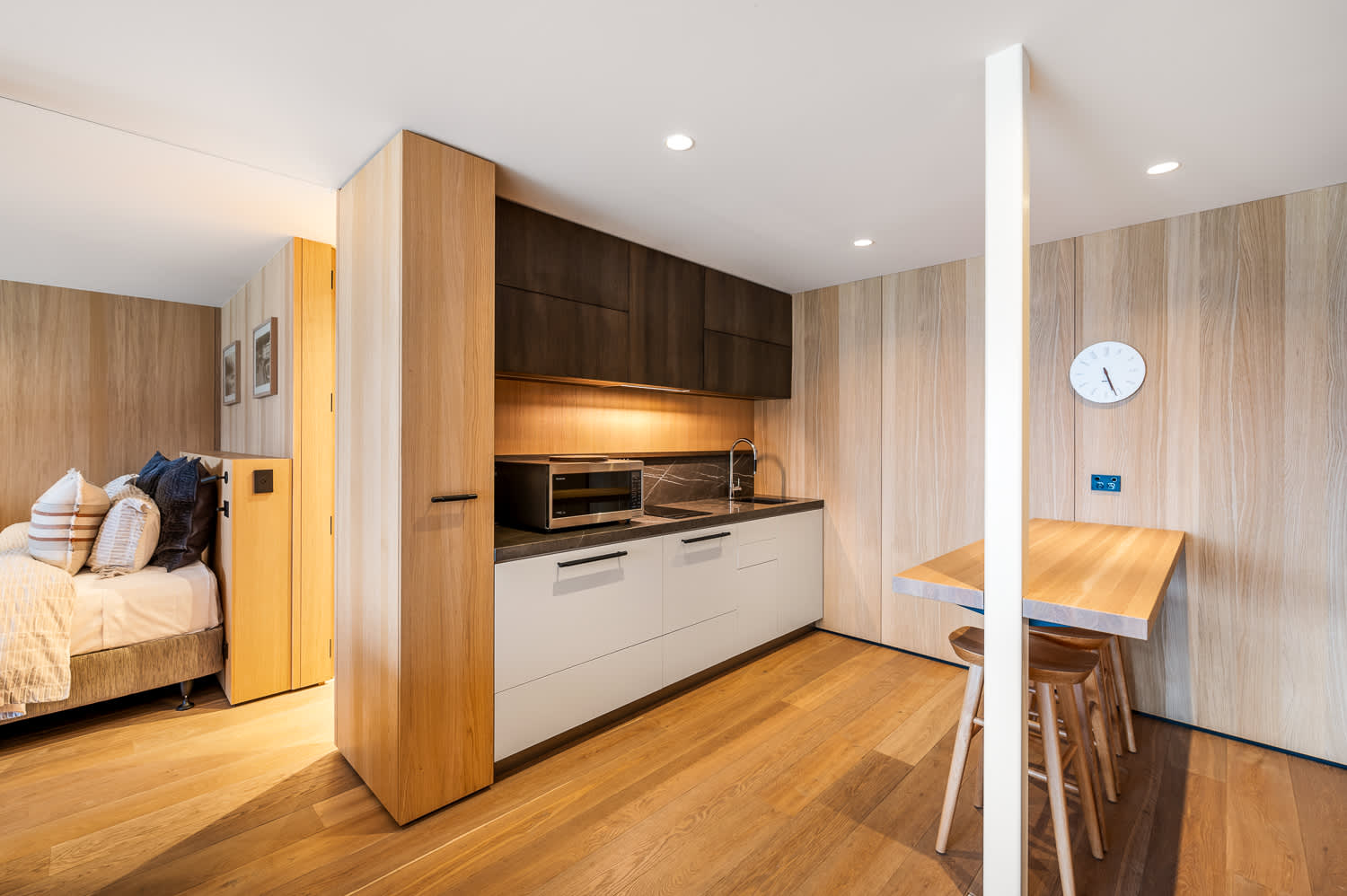 Sleek Kitchenette with Modern Essentials
This compact yet stylish kitchenette is equipped with modern appliances and everything you need for light meals and snacks. Perfect for added convenience during your stay.