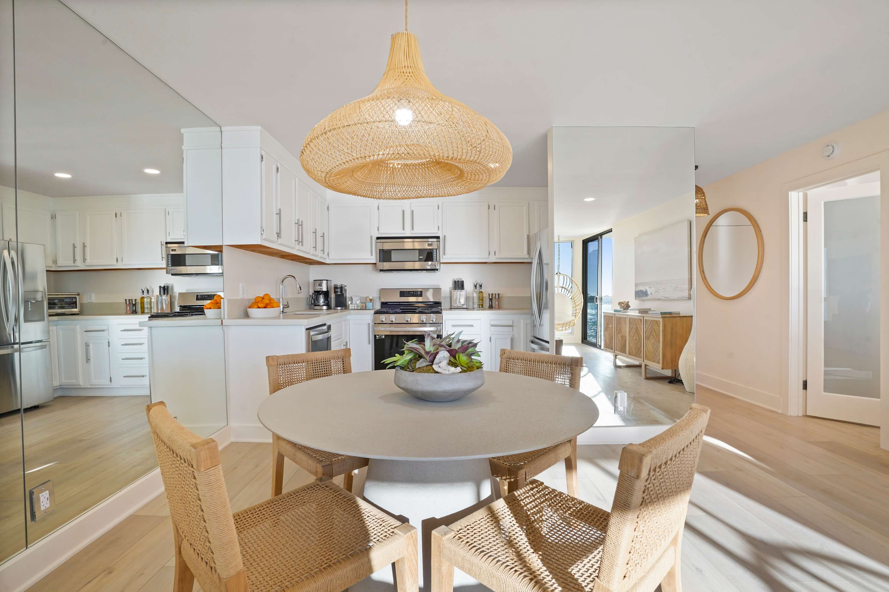 Sleek, fully equipped kitchen and dining area, perfect for home-cooked meals and gatherings.