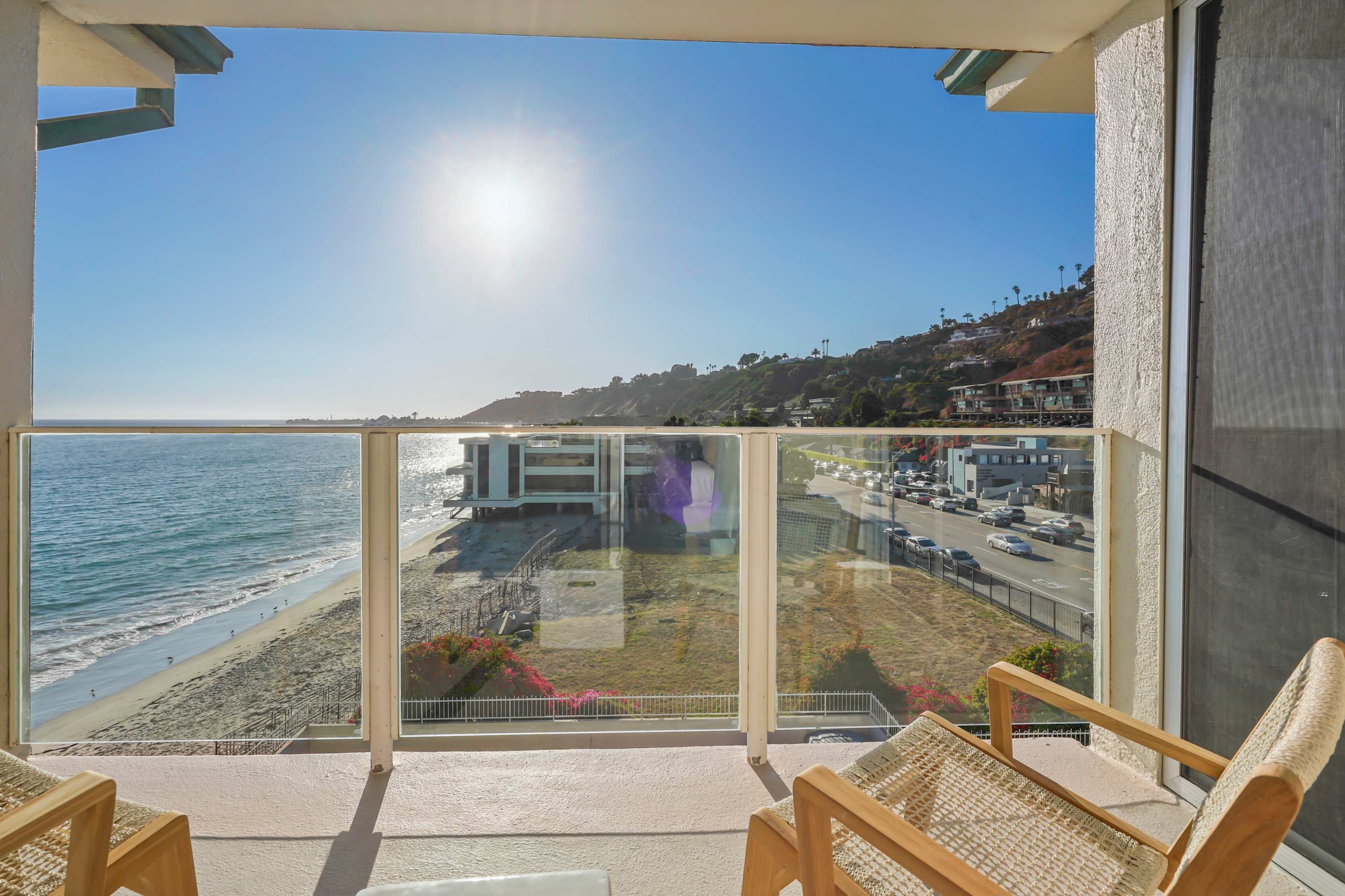 Enjoy morning coffee or evening drinks on your private balcony overlooking the Pacific Ocean.