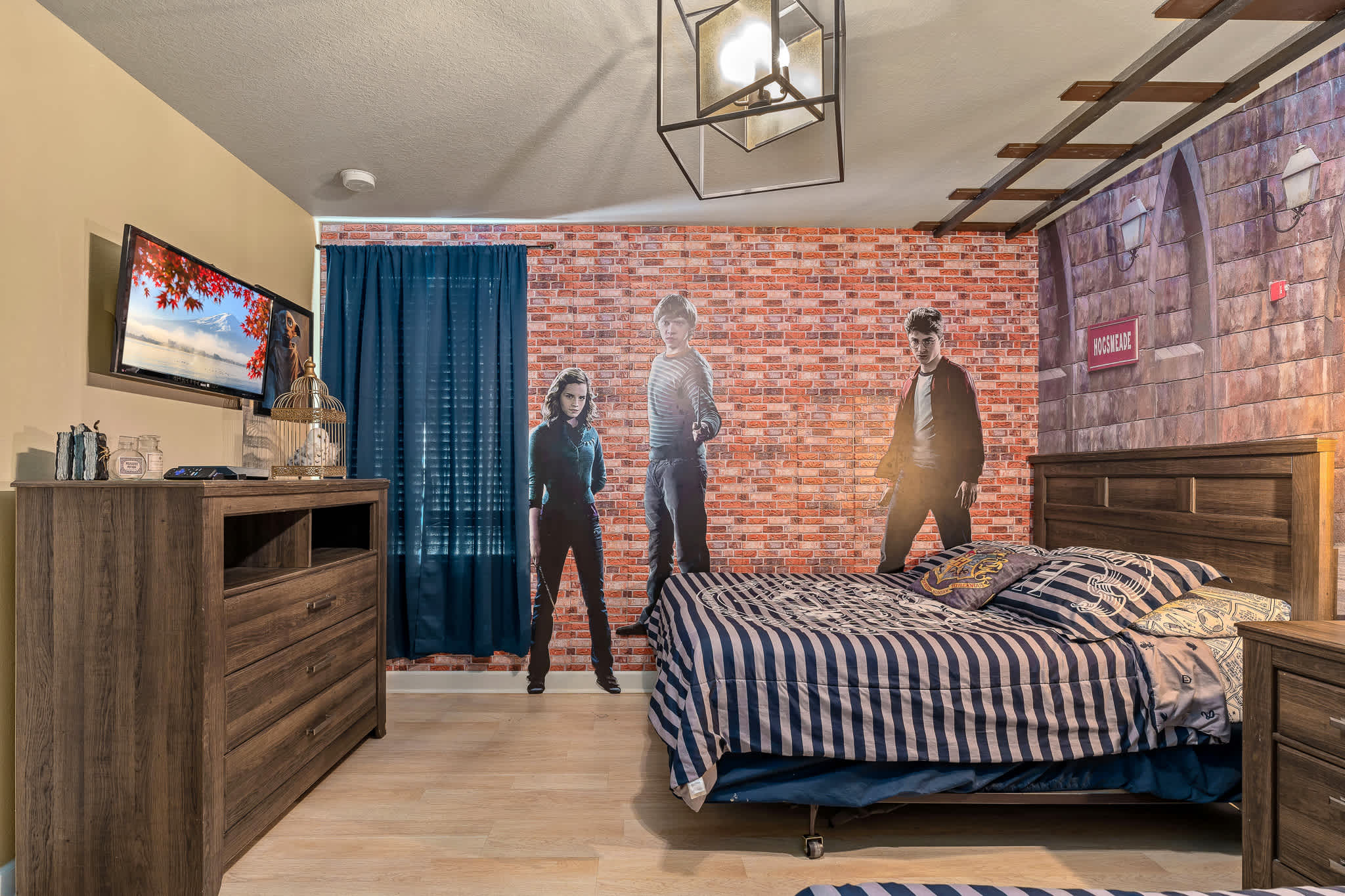 Another themed bedroom w/ bold decor and bed, perfect for a memorable stay.