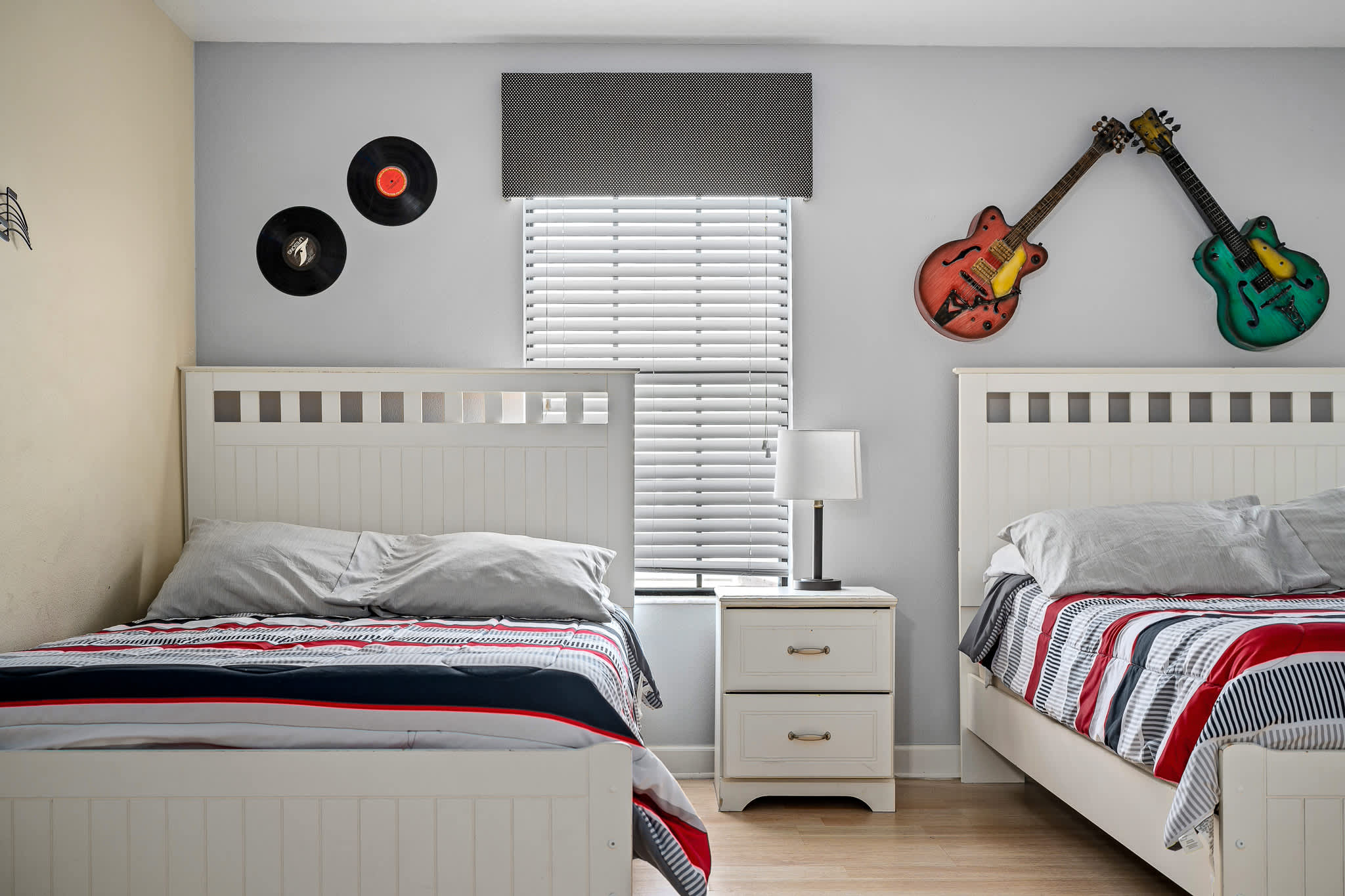 Bedroom w/ bed and plush pillows for cozy rest.