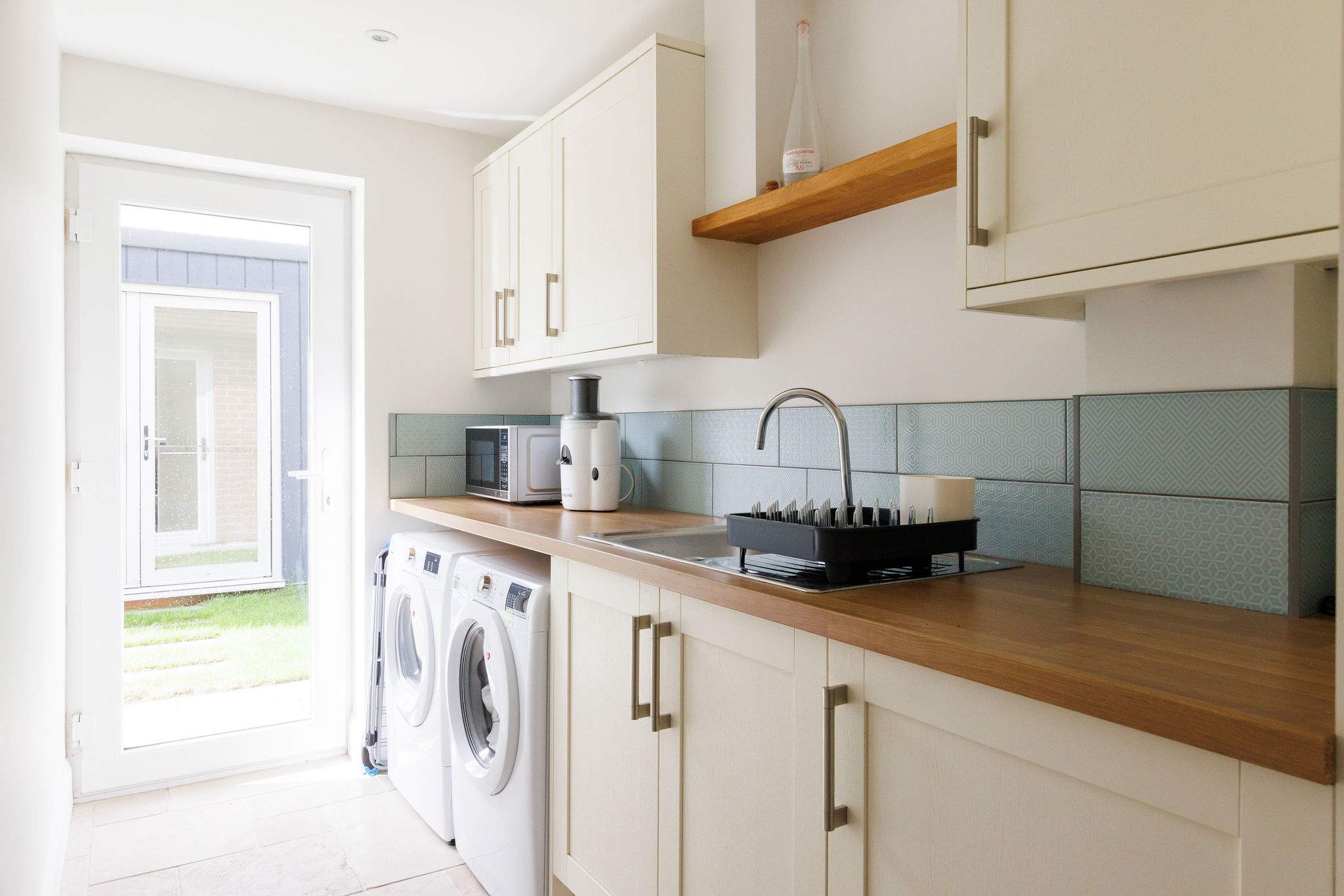 The separate utility room has everything you need to keep on top of washing and plenty of worktop space to organise bags for trips out.