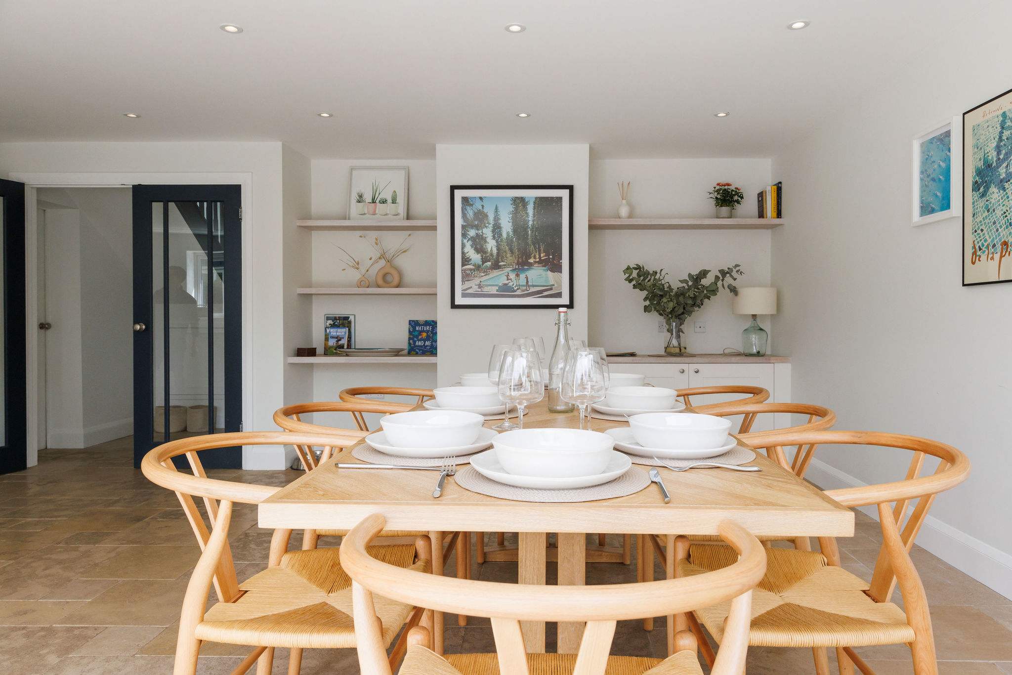 A dining table to seat 8 guests, perfect for a dinner party.
