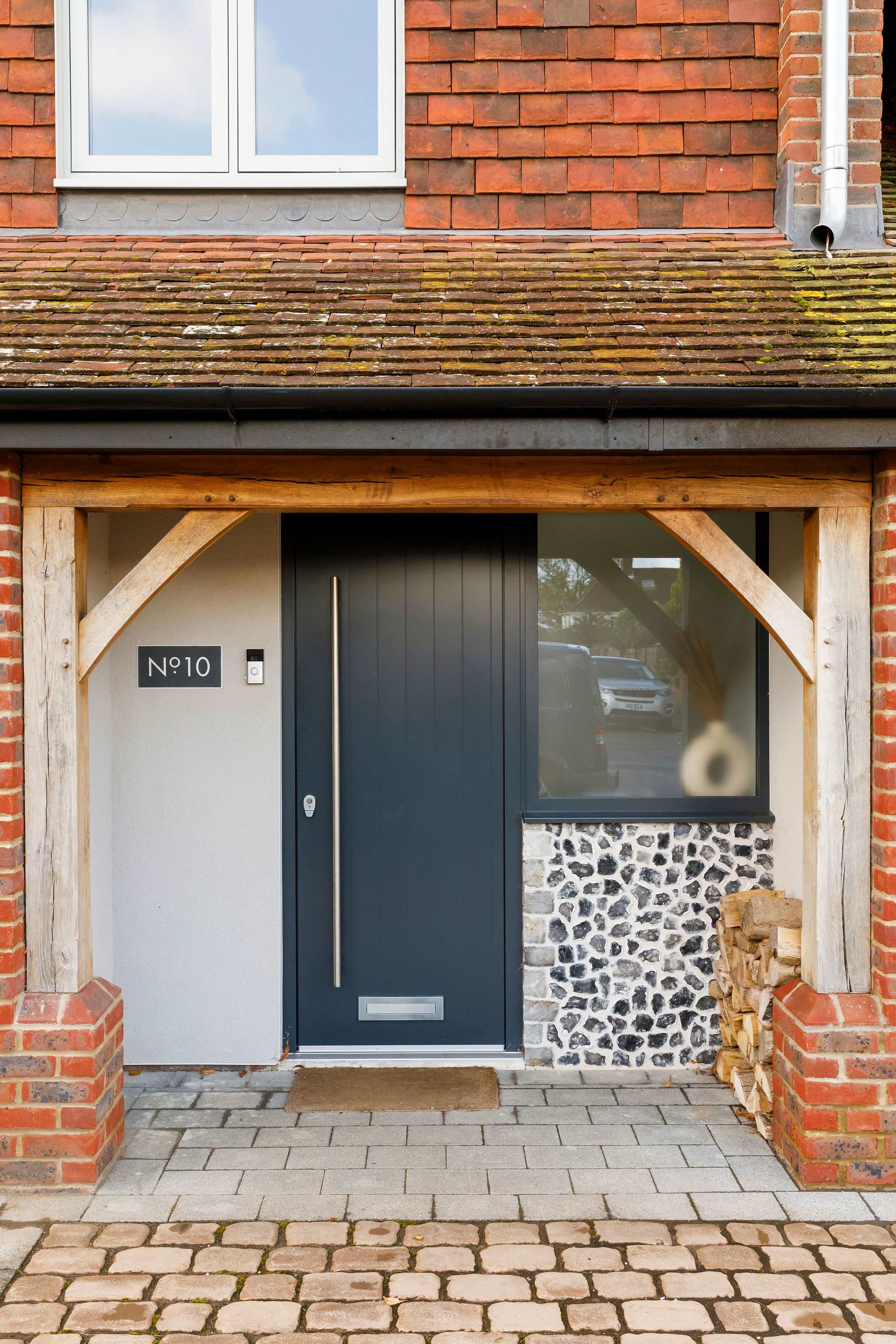 A covered porch entrance provides a welcoming gateway into the property.