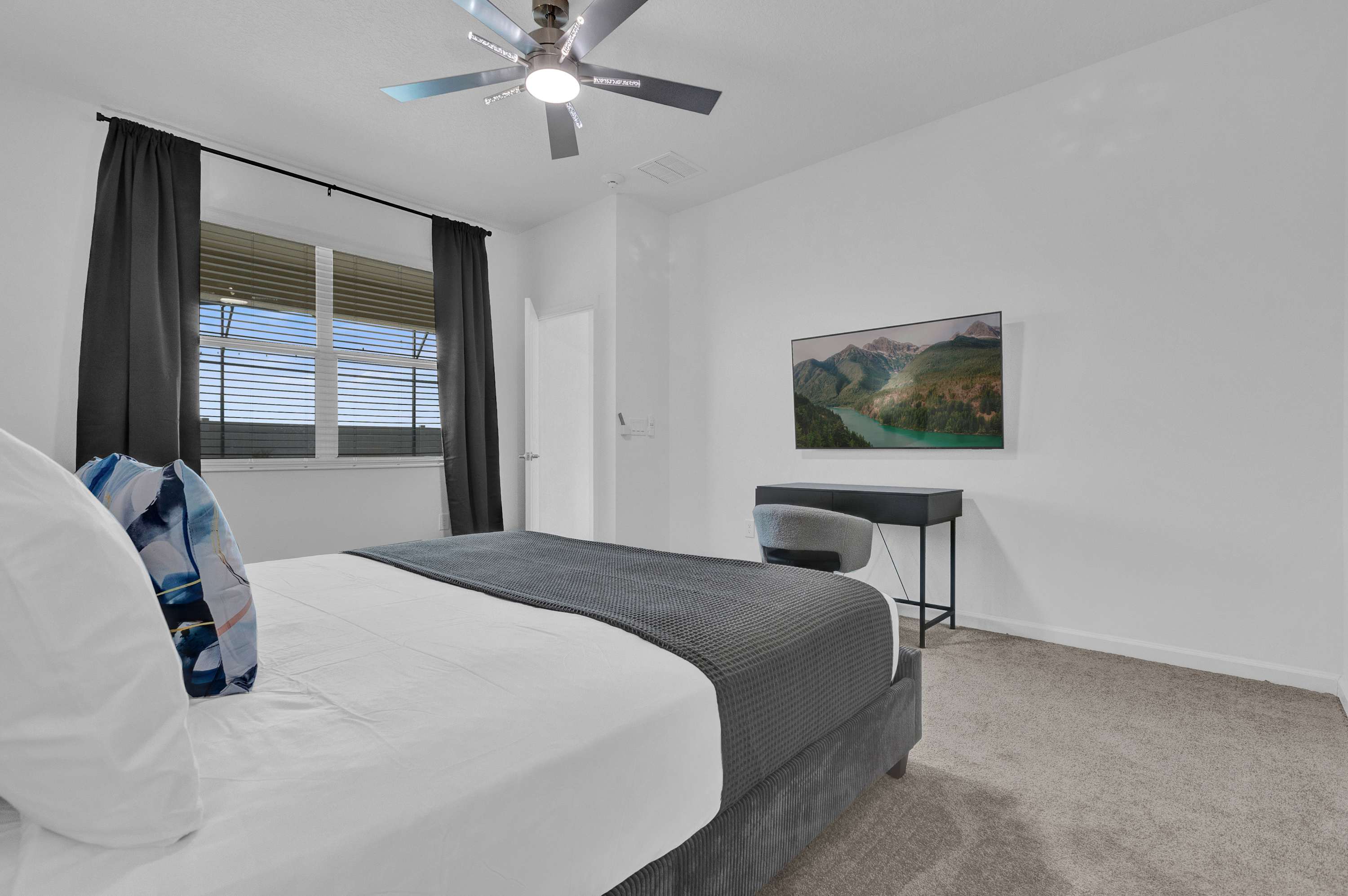 Stylish Queen Bedroom with Smart TV