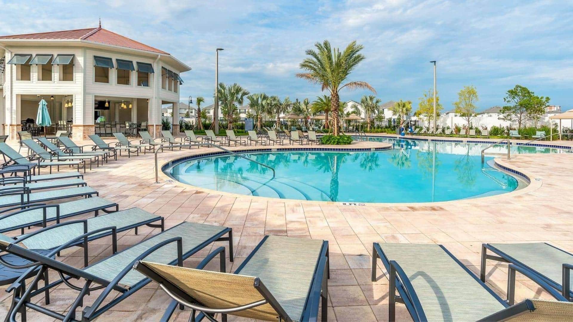 Resort sun loungers and tranquil pool