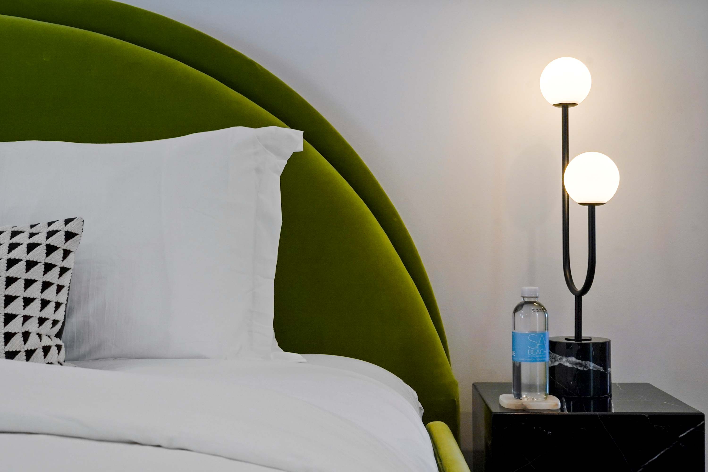 Plush beds with premium linens and blackout shades for restful sleep.
