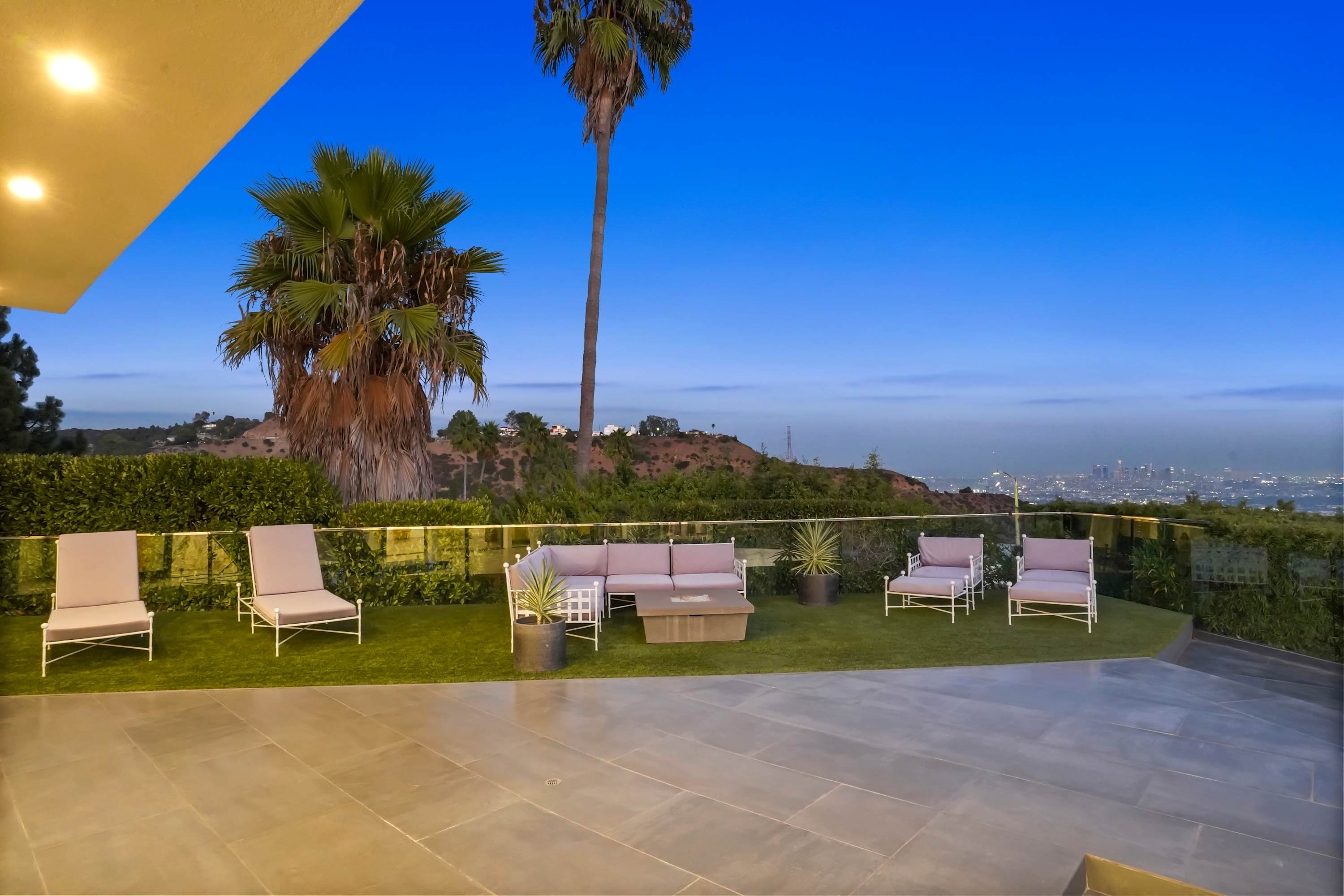 Ambient lighting transforms the pool for magical evening swims.