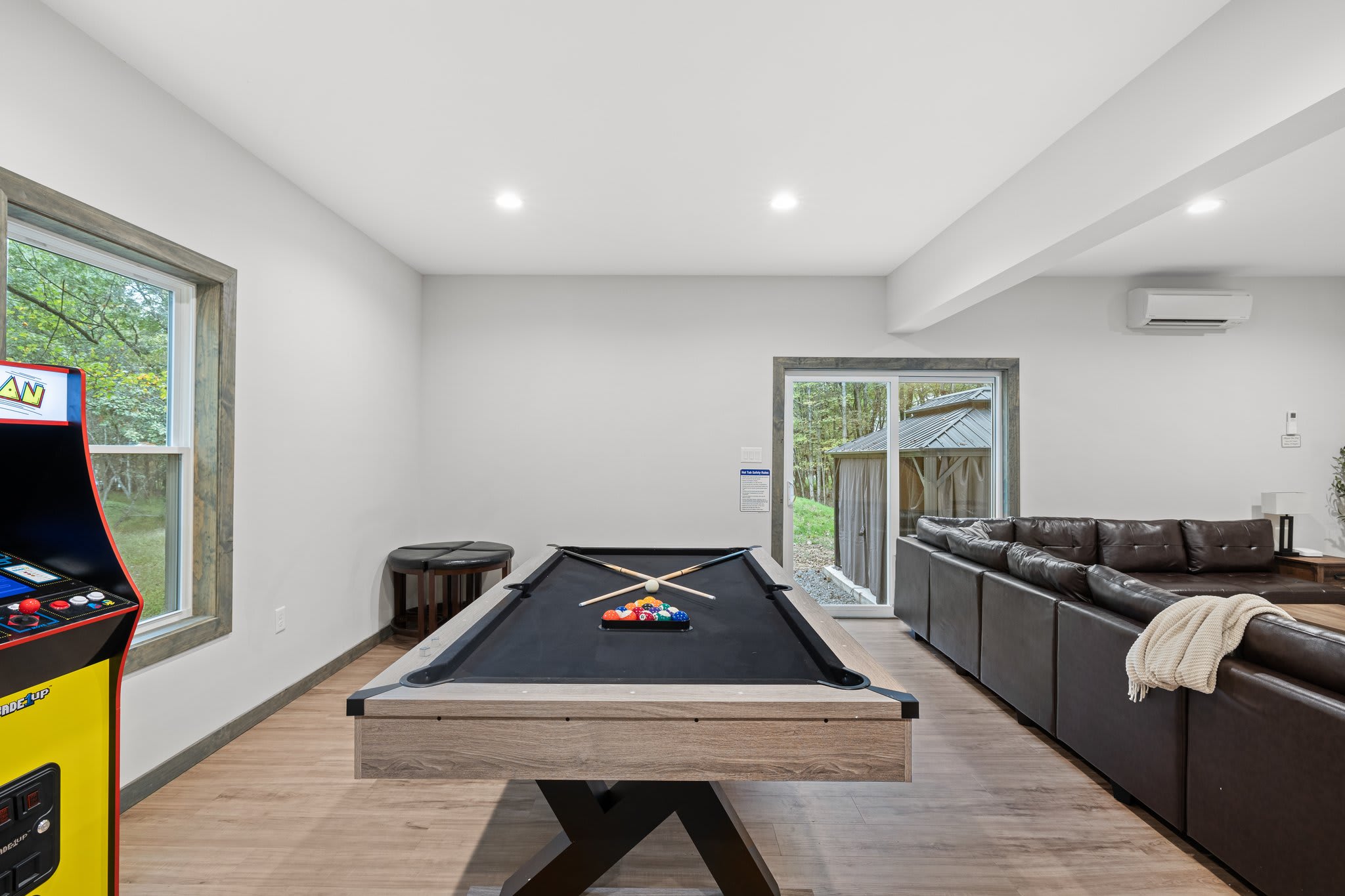 Classic fun meets comfort. Enjoy a round of pool while staying connected to the rest of the hangout area.