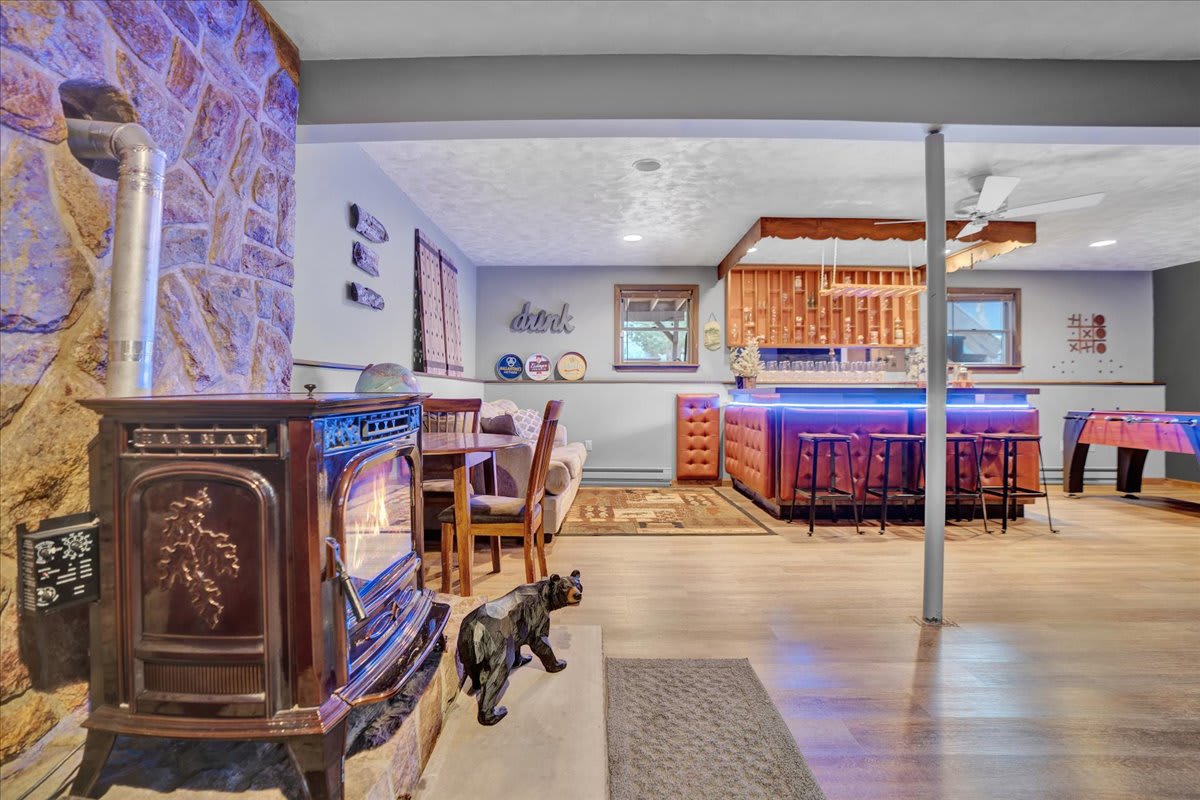 Lounge & Bar Area with a Classic Vibe – A stylish entertainment space blending rustic charm with modern bar lighting, creating the perfect atmosphere for socializing.