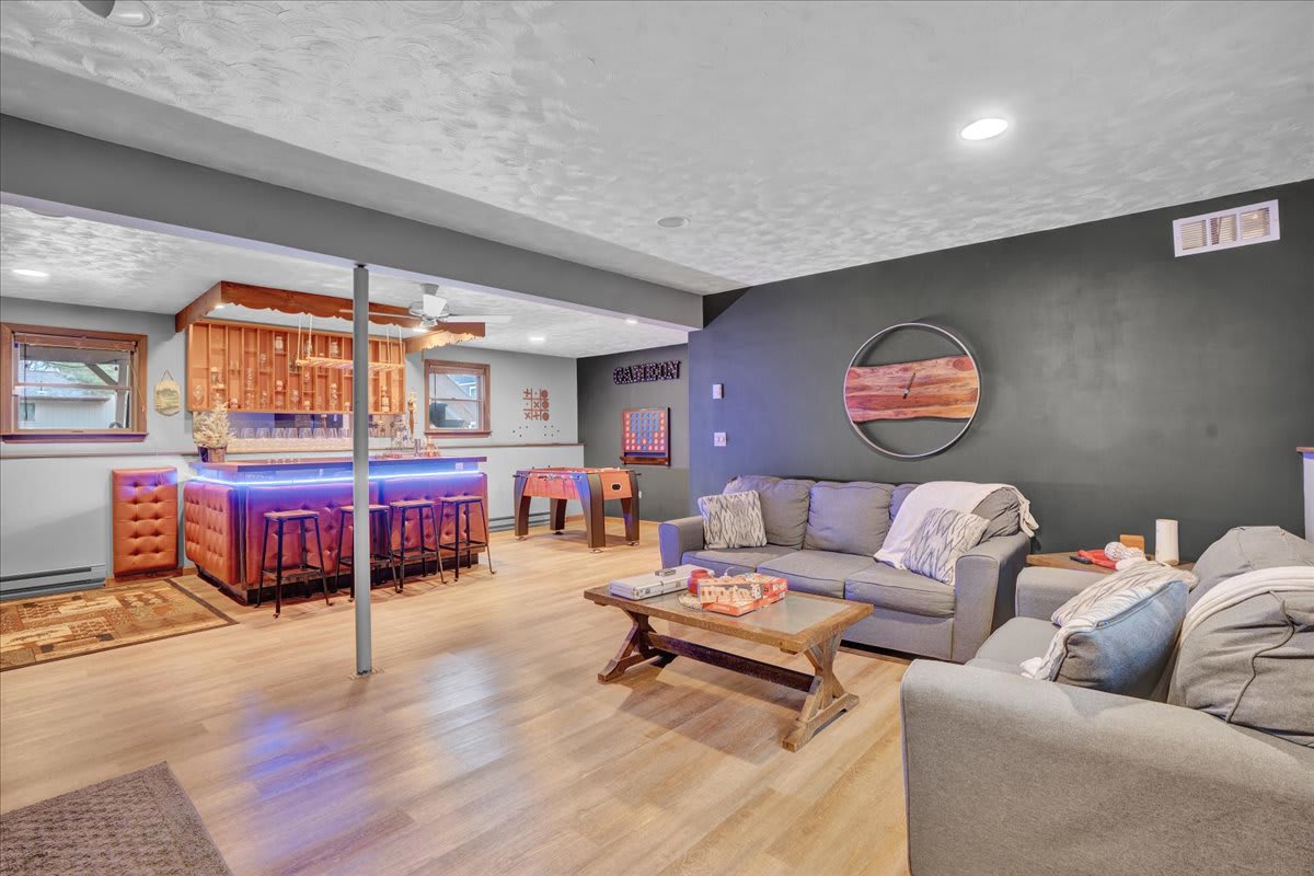 Cozy Bar & Lounge Area – A welcoming entertainment space with a well-stocked bar, comfortable seating, and soft lighting for the ultimate relaxation experience.