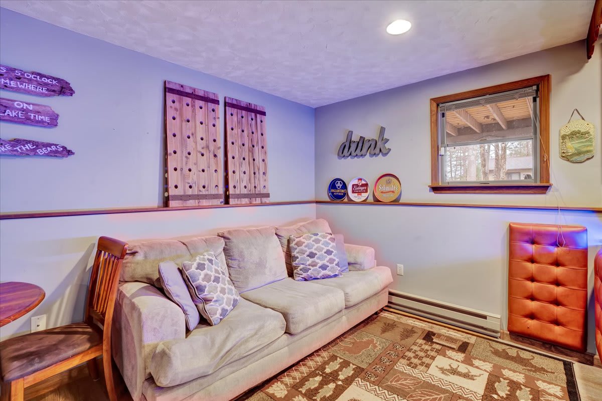 Laid-Back Lounge Area – A comfy seating nook with warm lighting and playful decor, making it an ideal spot for casual conversations or a movie night.