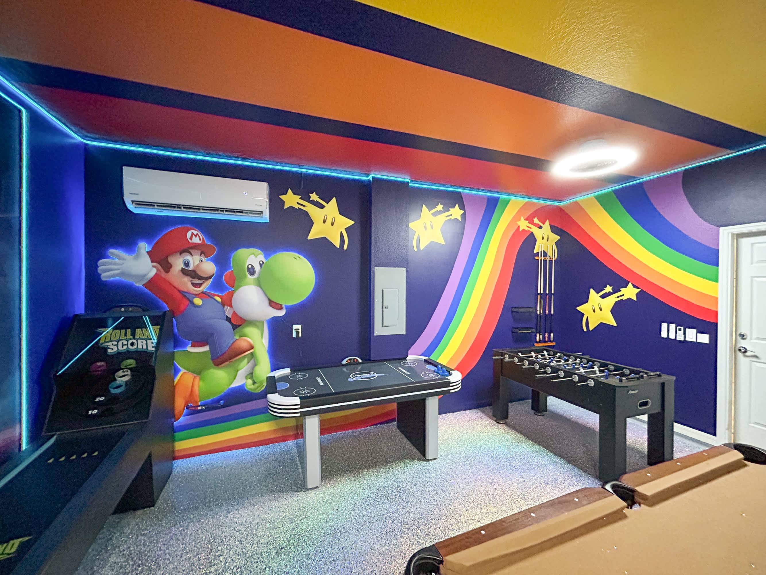 Foosball, billiards, air hockey and more in the Mario Bros themed games room