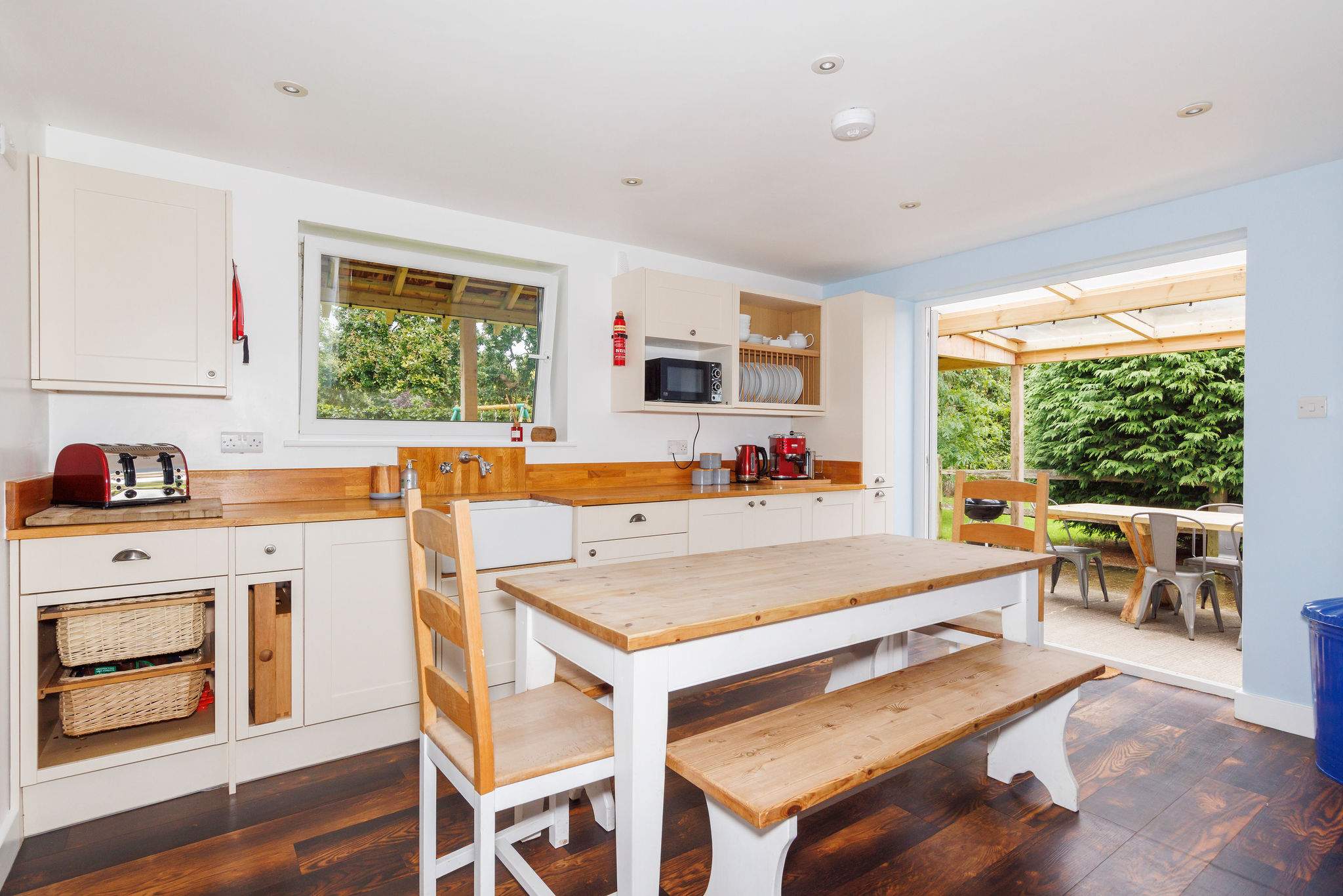 The dining table seats up to 8 guests to enjoy meals together.