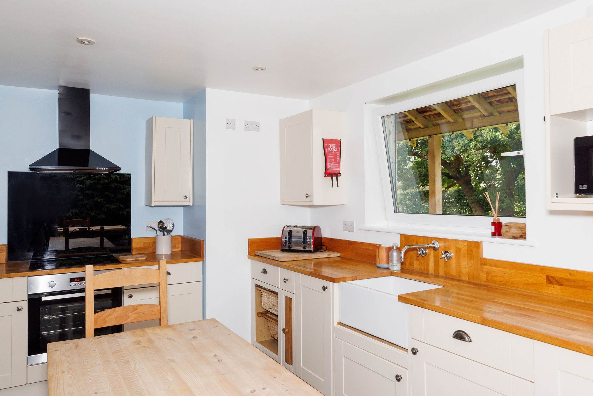 Enjoy looking out to countryside surroundings while cooking for friends and family.