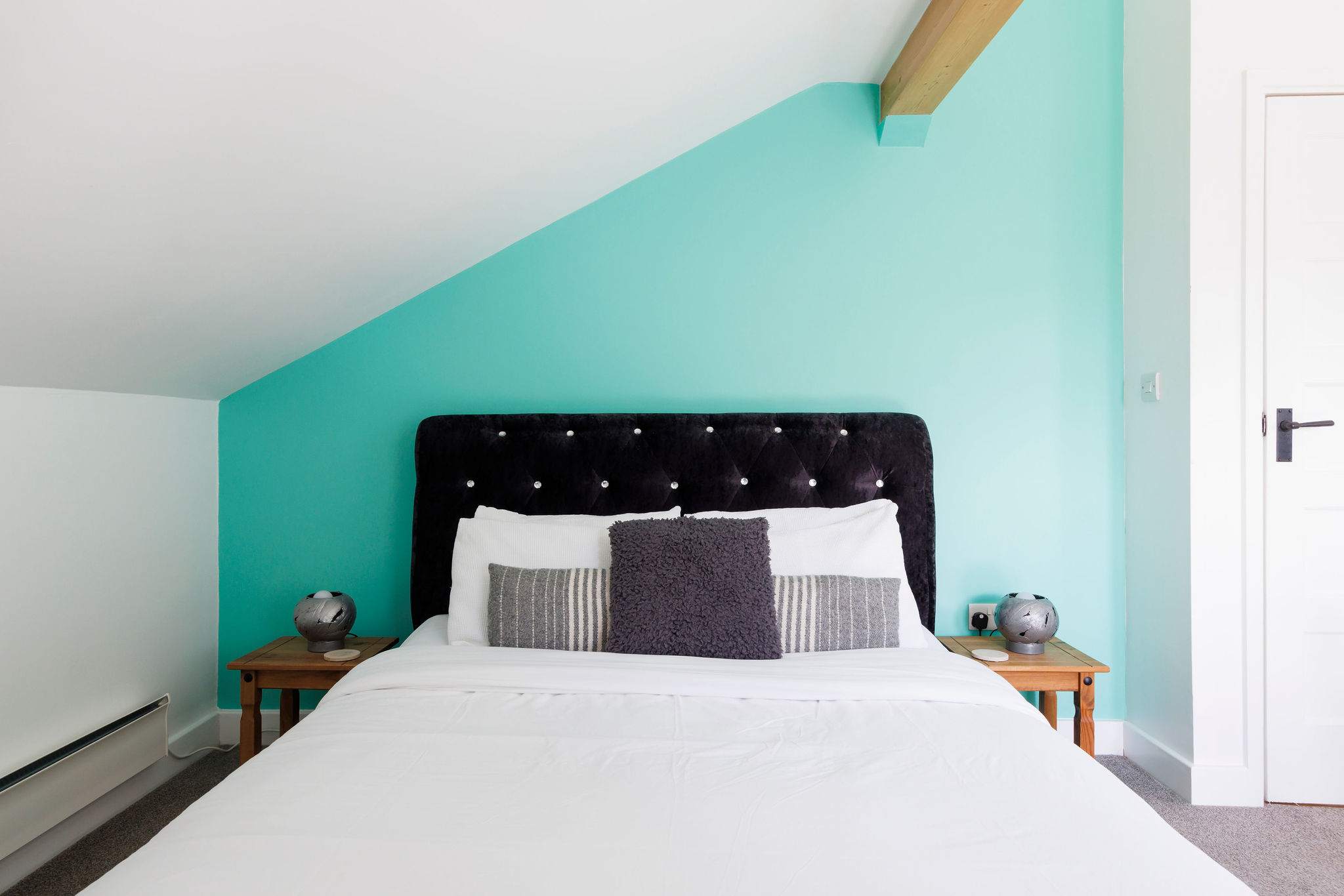 The master bedroom has a plush king bed, guaranteeing a great night's sleep.