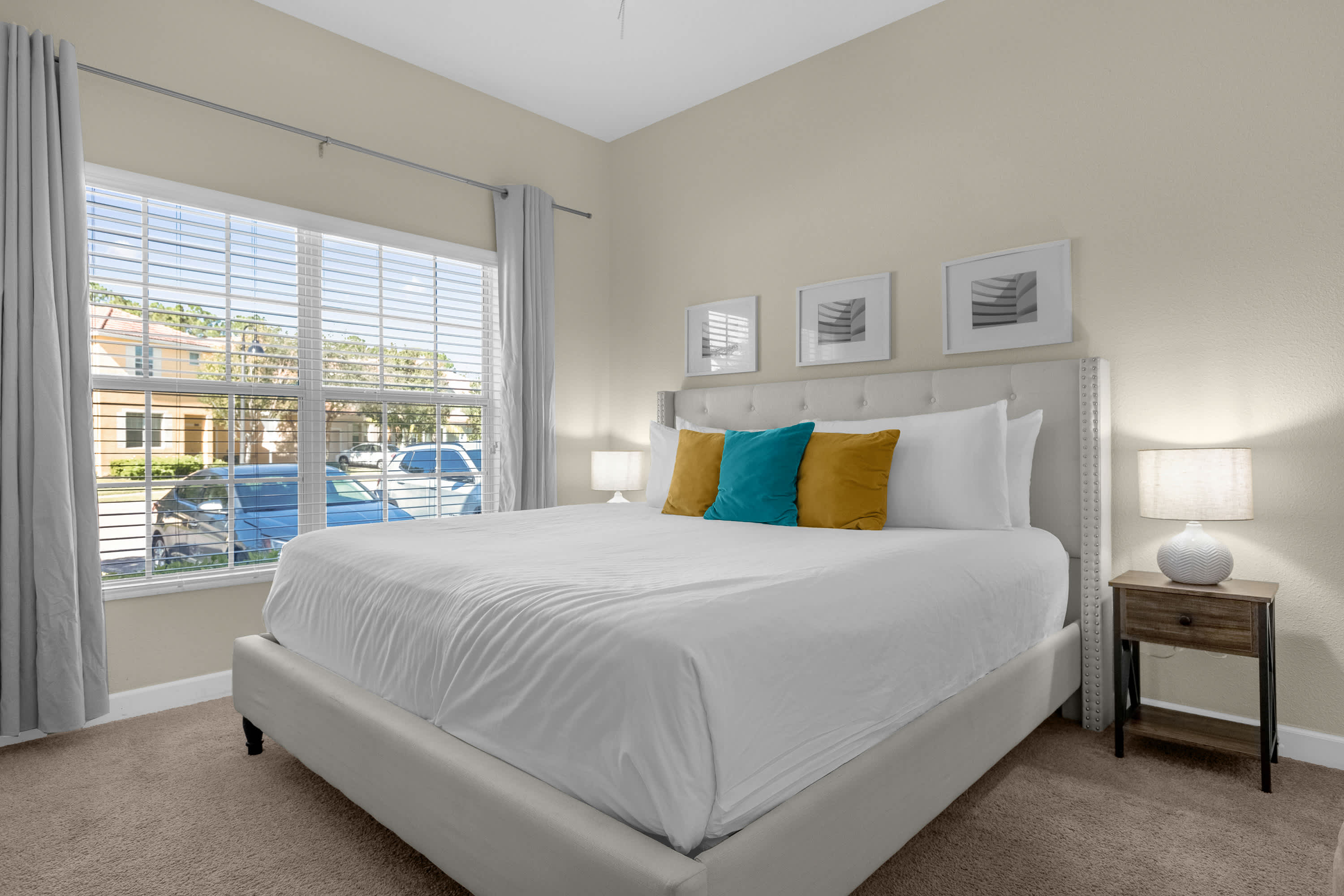 King Bedroom with Large windows and lots of Natural light