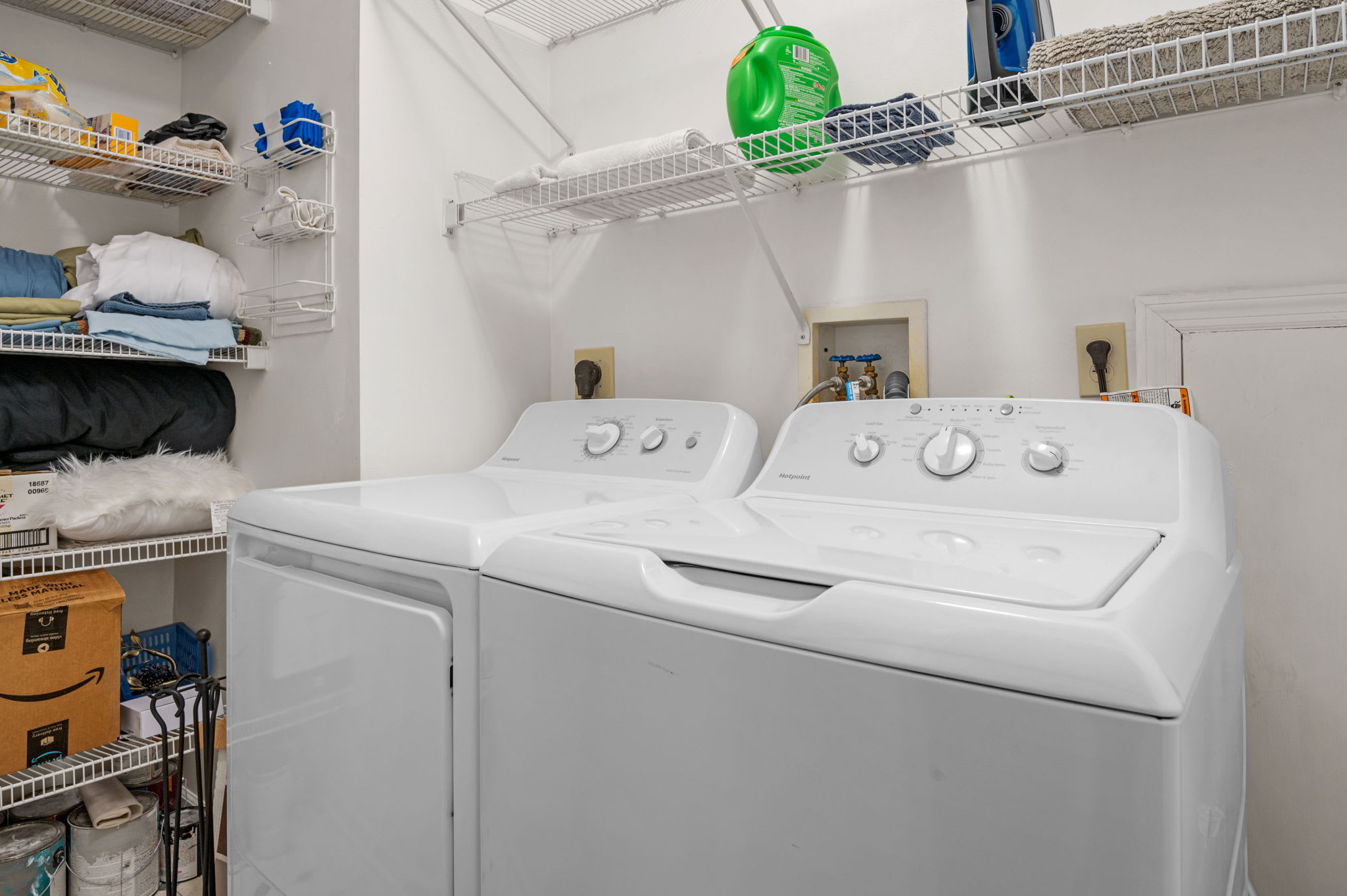 Enjoy the convenience of a full-size washer and dryer, thoughtfully stocked with basic laundry essentials.