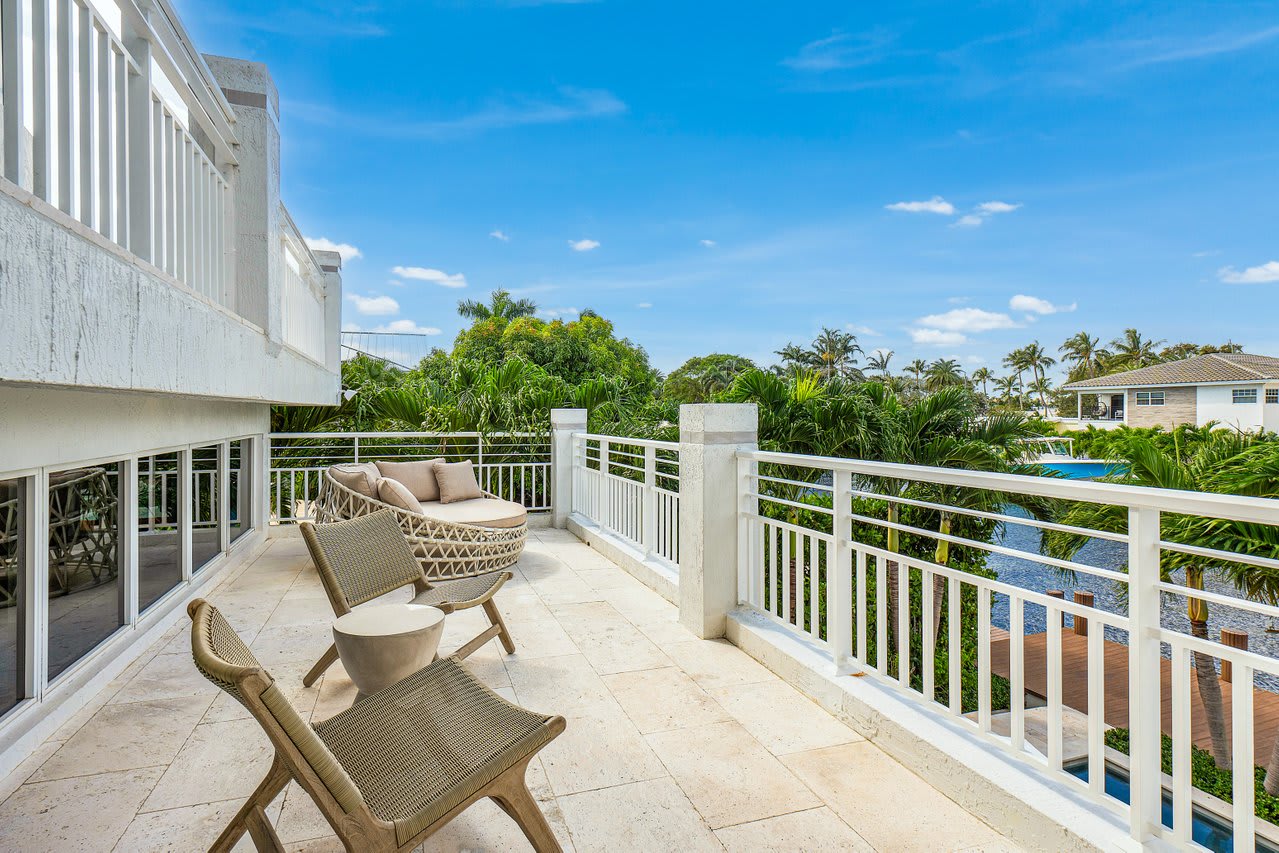 Private balcony with comfortable seating, perfect for enjoying morning coffee or evening sunsets.