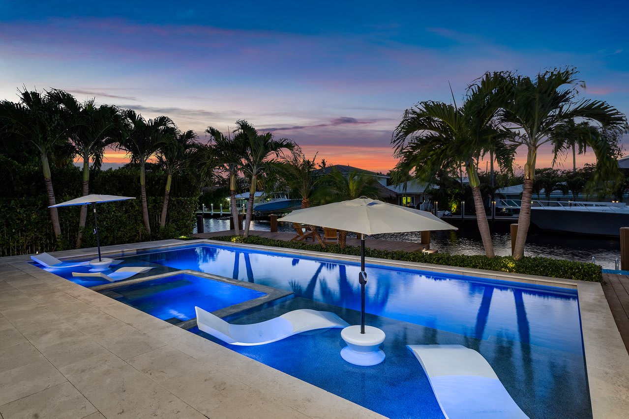 Experience twilight perfection as the pool’s reflections mirror the sky.