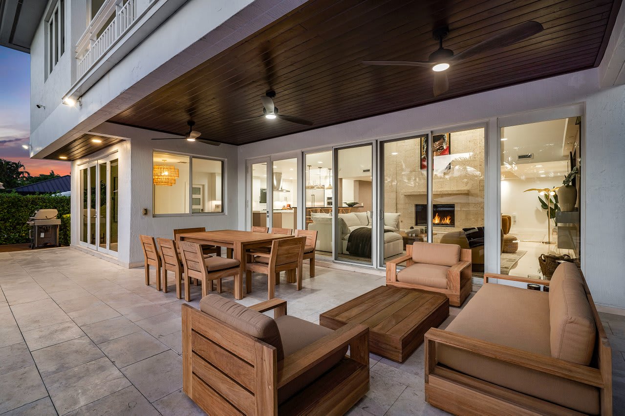 Spacious outdoor lounge designed for easy conversations and laid-back gatherings by the pool.