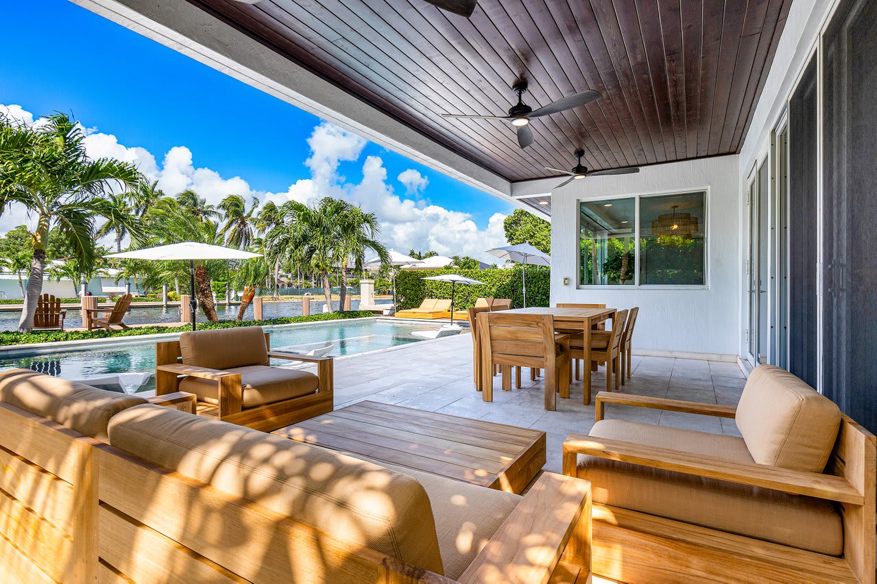 Lounge in shaded comfort with seamless indoor-outdoor flow.