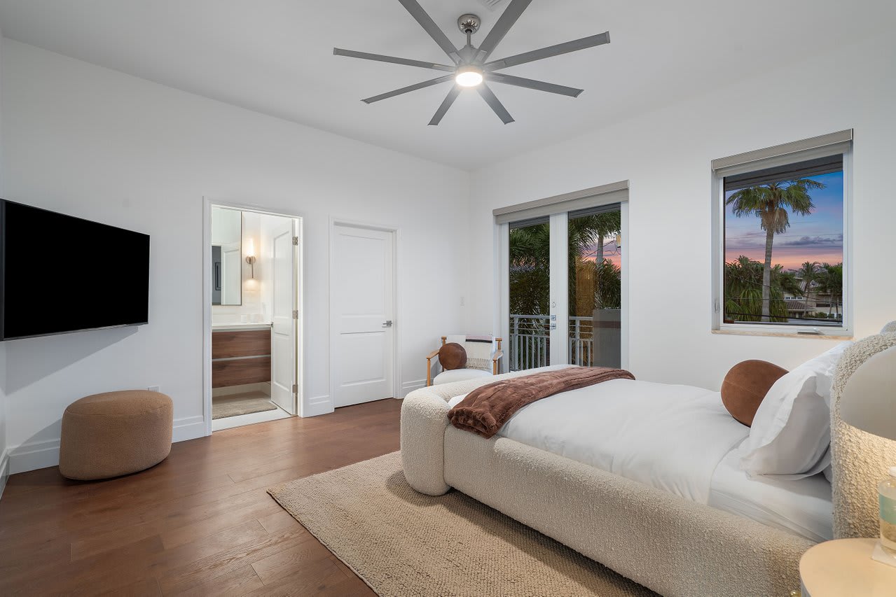 Drift into relaxation in the dreamy Guest bedroom, with plush textures, a soft palette, and endless sunset views.