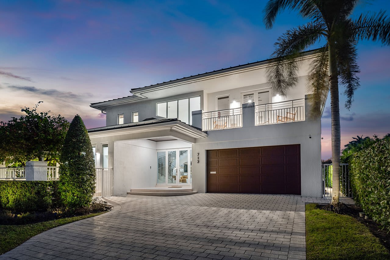 Arrive in style to a spacious, well-lit driveway.