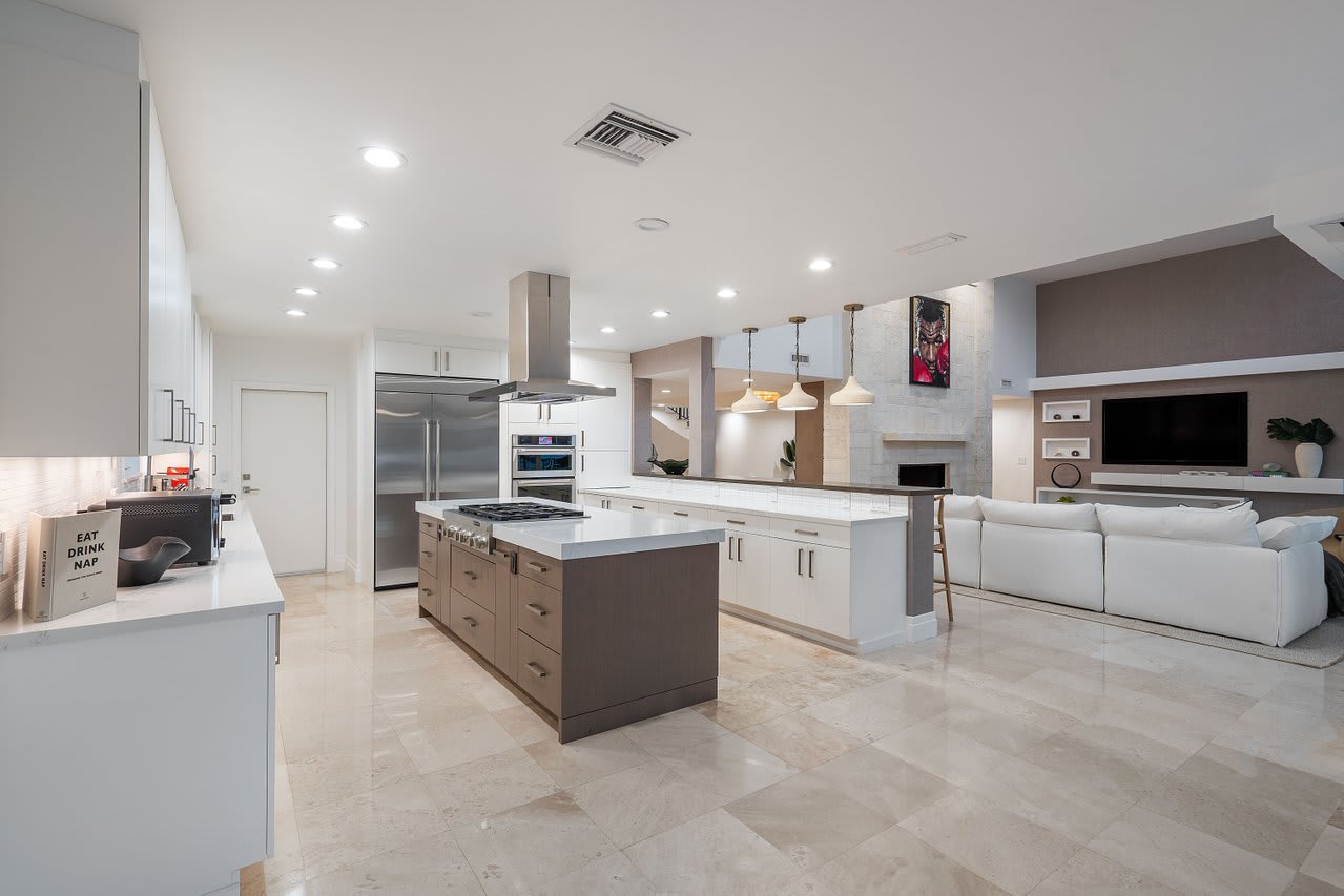 Open-plan kitchen seamlessly flows into the living area—perfect for cooking and connecting.