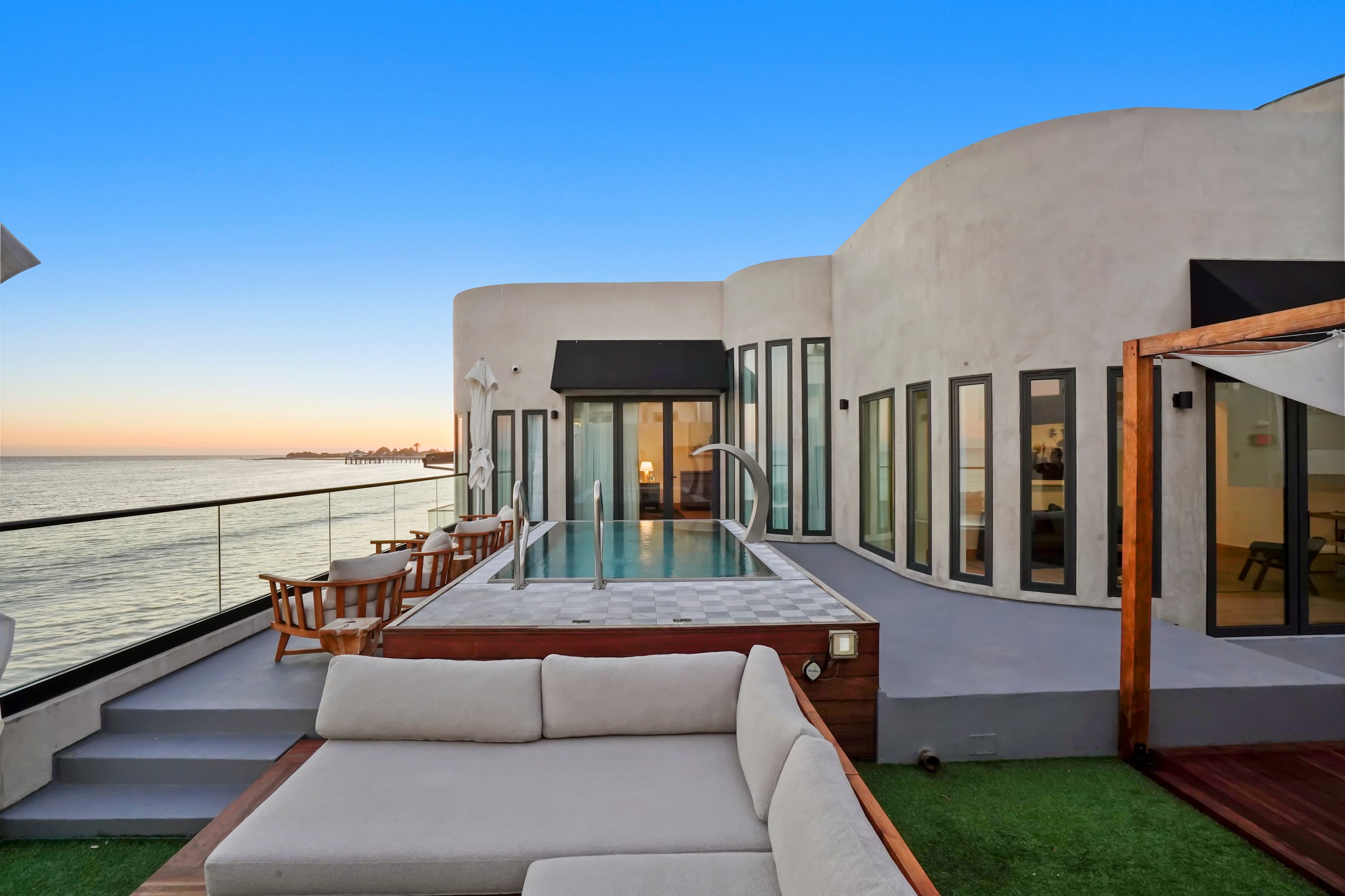 Soft lighting, ocean views, and spacious sofas – all you need to relax.