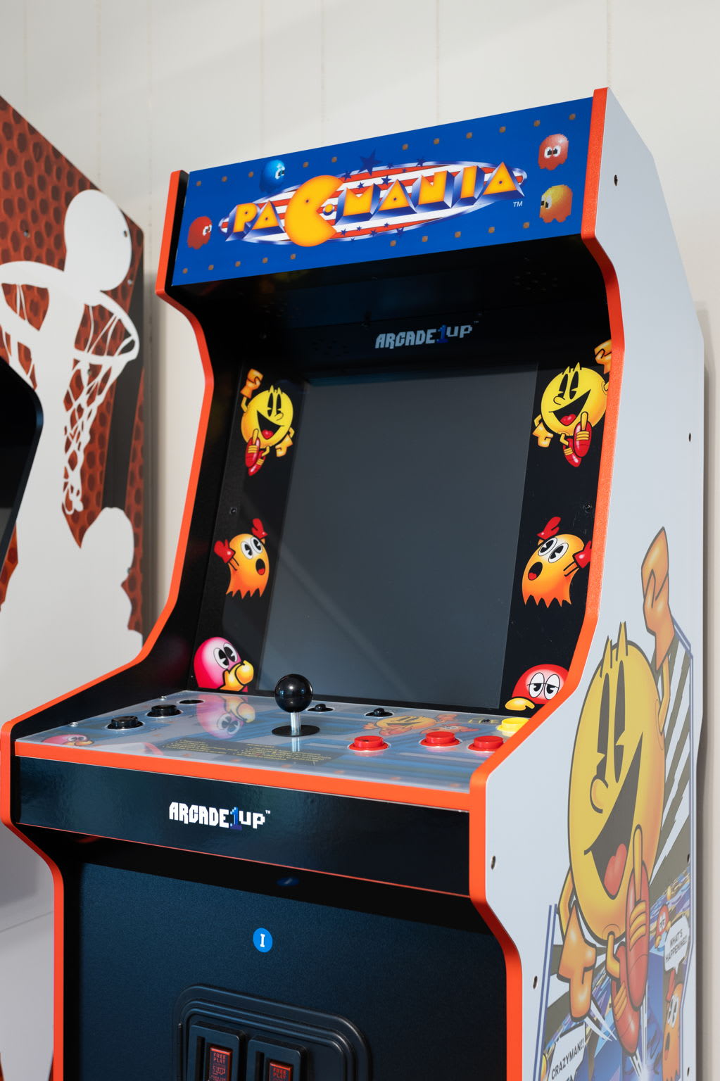  A detailed look at the retro arcade joystick and buttons, ready for exciting gameplay.