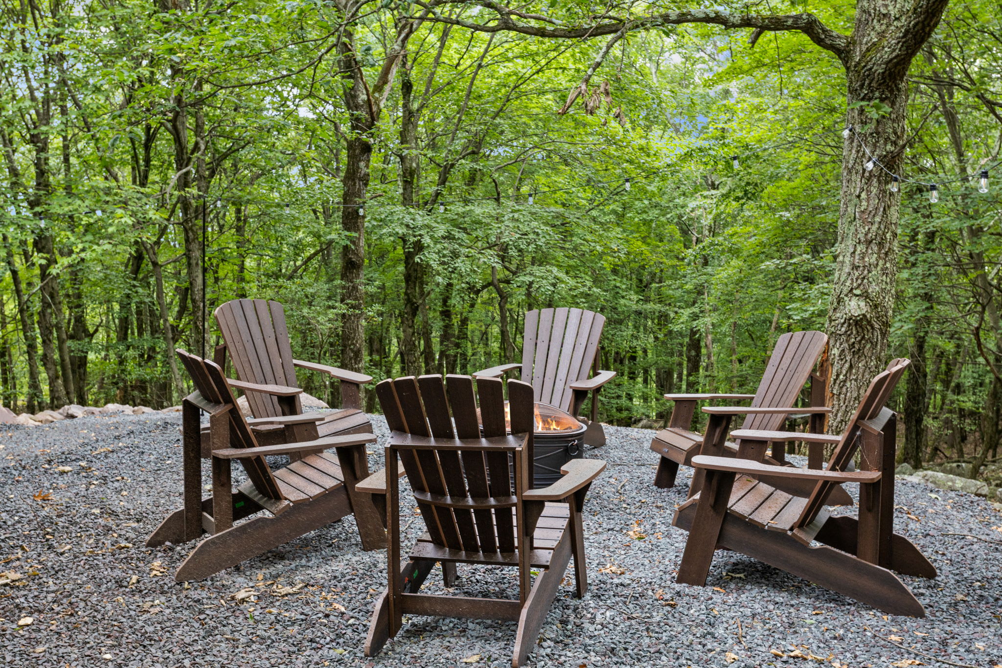 Expanded Fire Pit Seating - A wider view showcasing multiple seating arrangements, ideal for group gatherings.