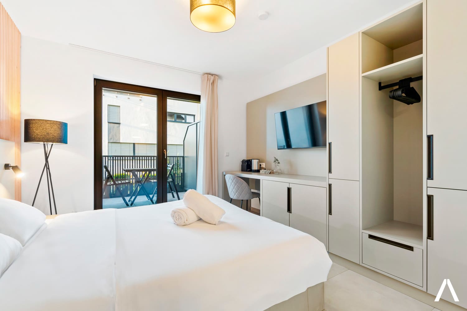Comfortable and Stylish Retreat – Rest easy in a serene space with a plush queen bed and your own private balcony
